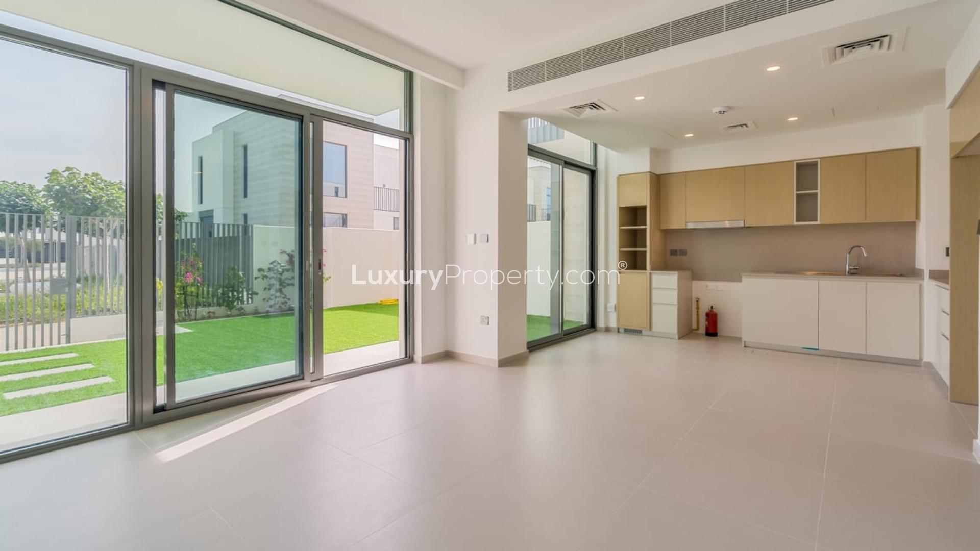 Elegant 3-bedroom townhouse exterior in Sun, Arabian Ranches 3, available for rent