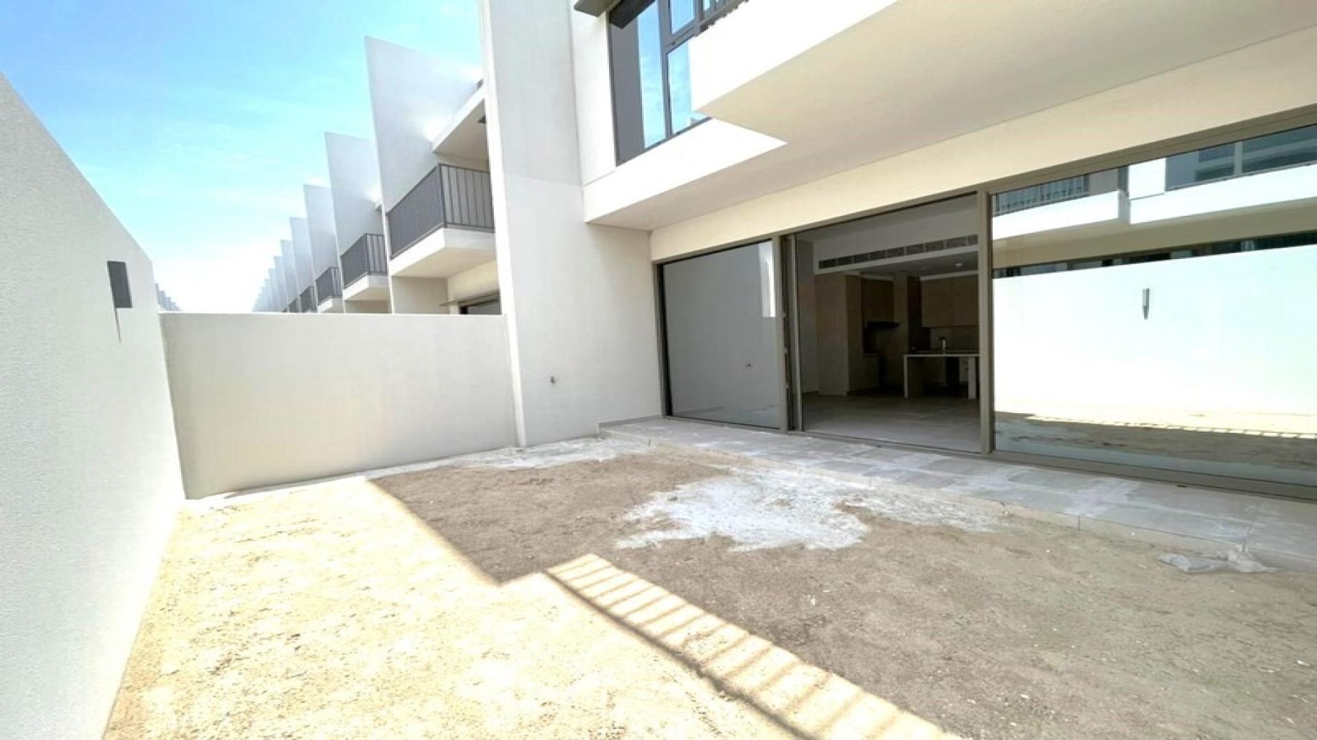 Modern townhouse kitchen and living area with sleek design, District 7, Mohammed Bin Rashid City