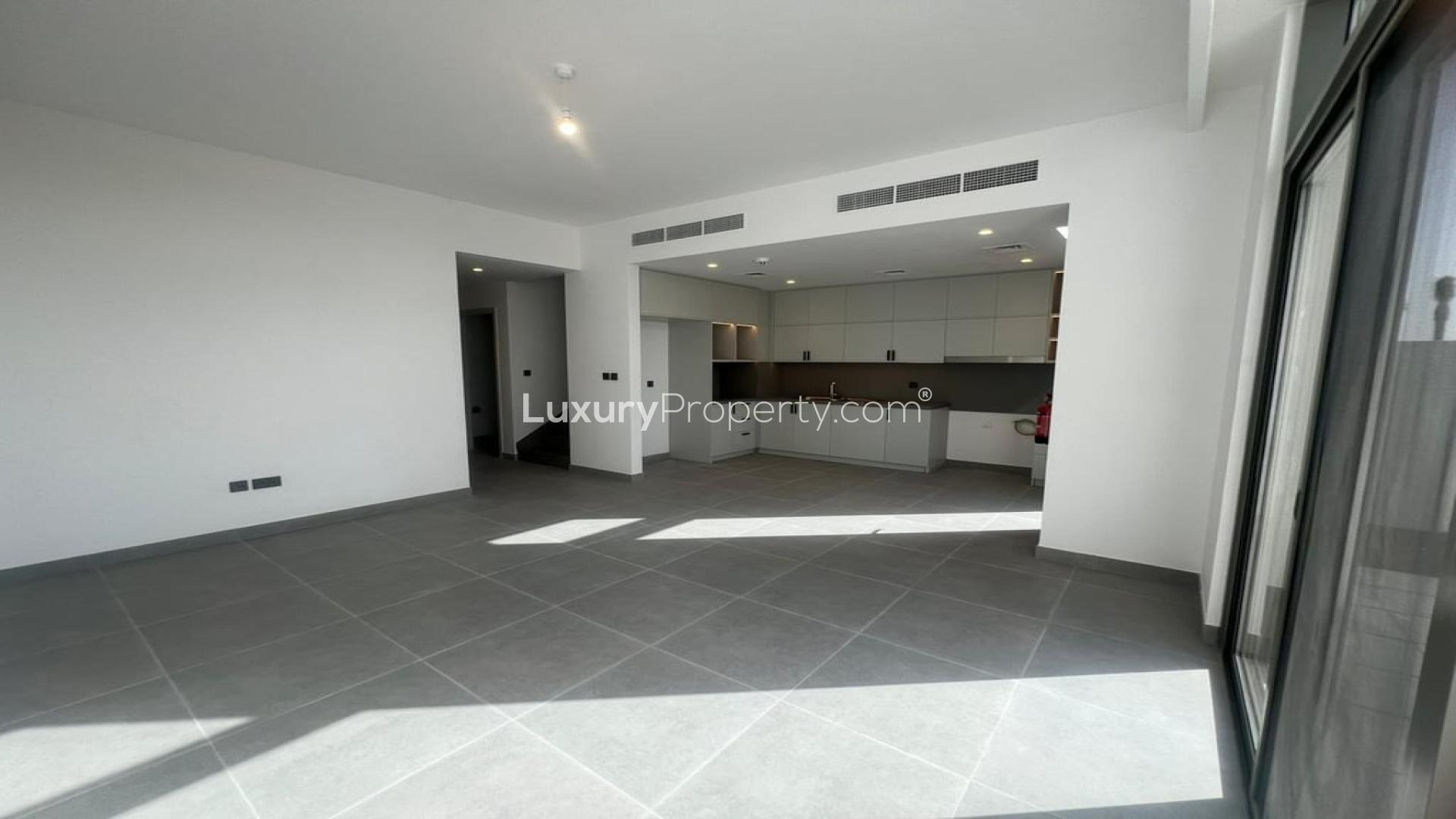 Modern townhouse exterior in Arabian Ranches III, Ruba community, available for rent