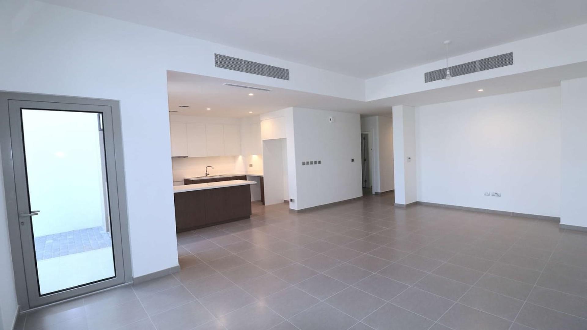 Spacious living room in Arabian Ranches 2 townhouse for rent, Reem Community