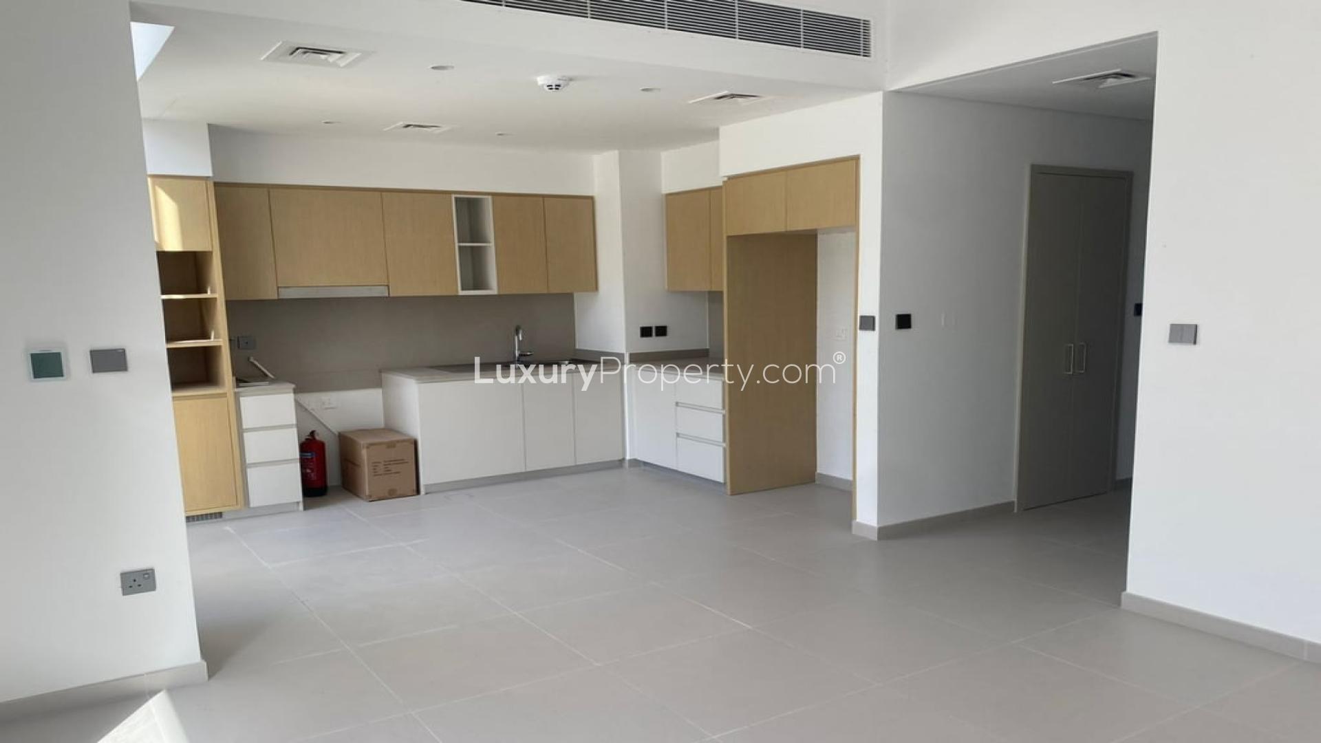 Townhouse exterior with carport in Arabian Ranches 3, Joy sub-community, available for rent