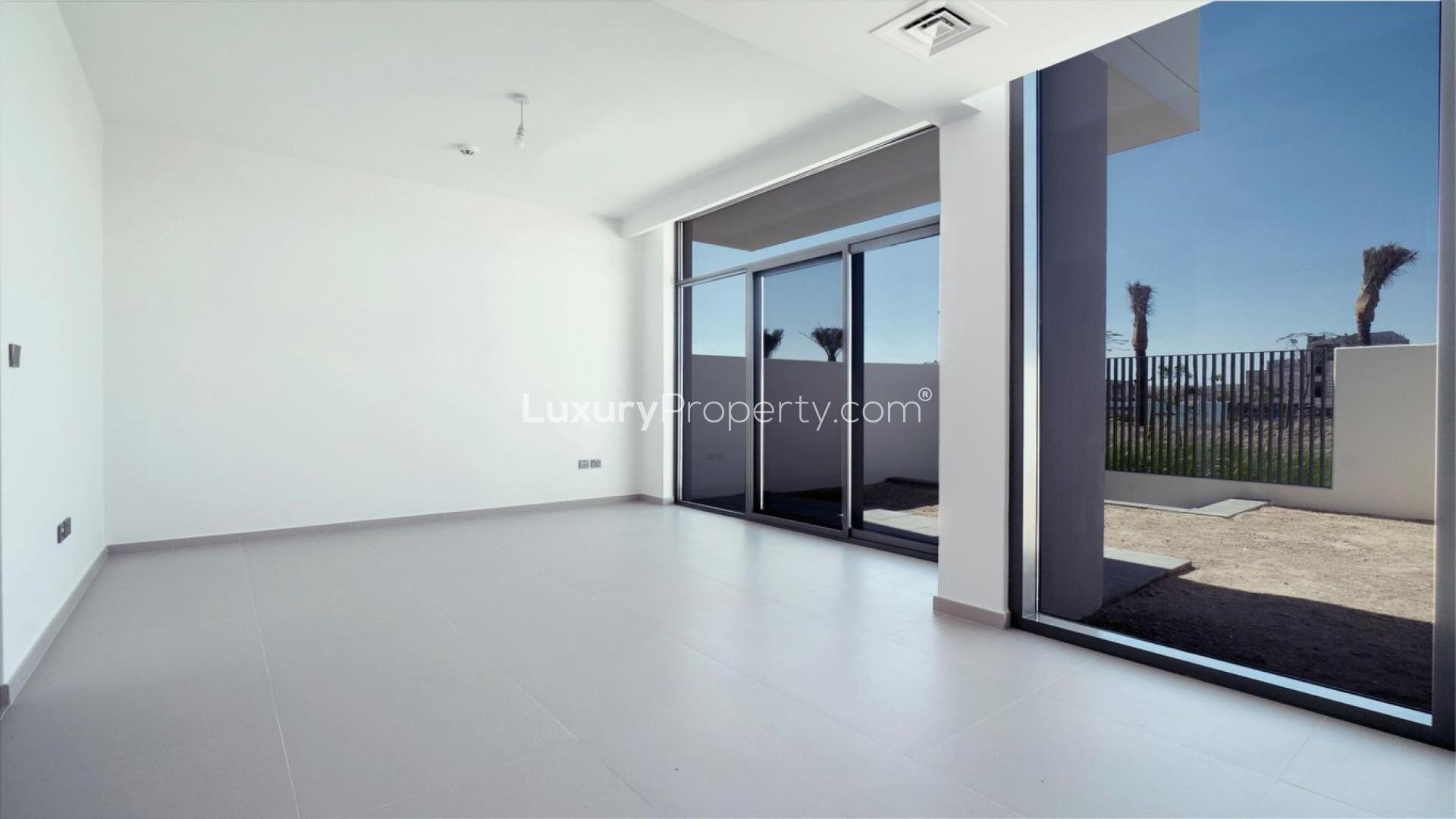 Modern kitchen with large window in Arabian Ranches III townhouse for rent