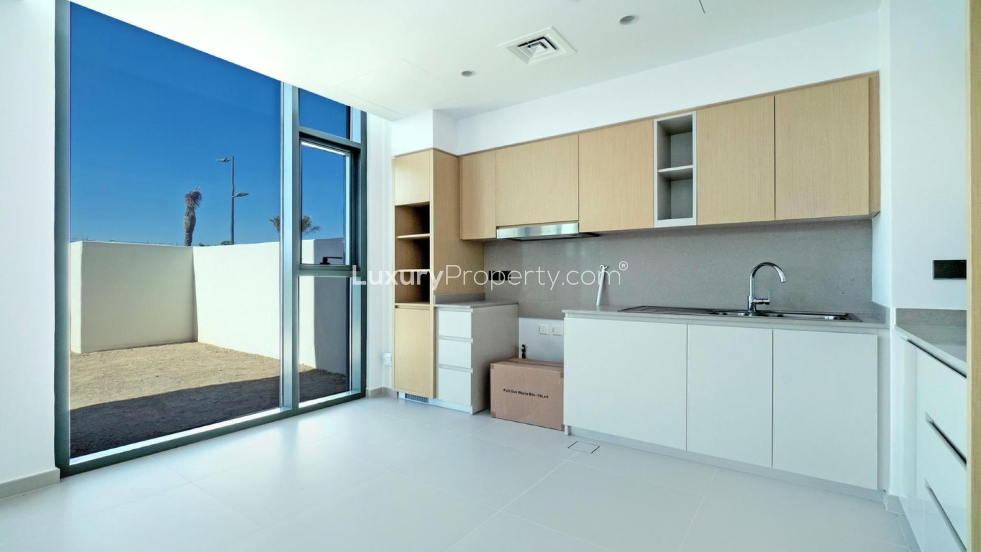 Modern kitchen in spacious townhouse, Arabian Ranches III, Joy community, available for rent
