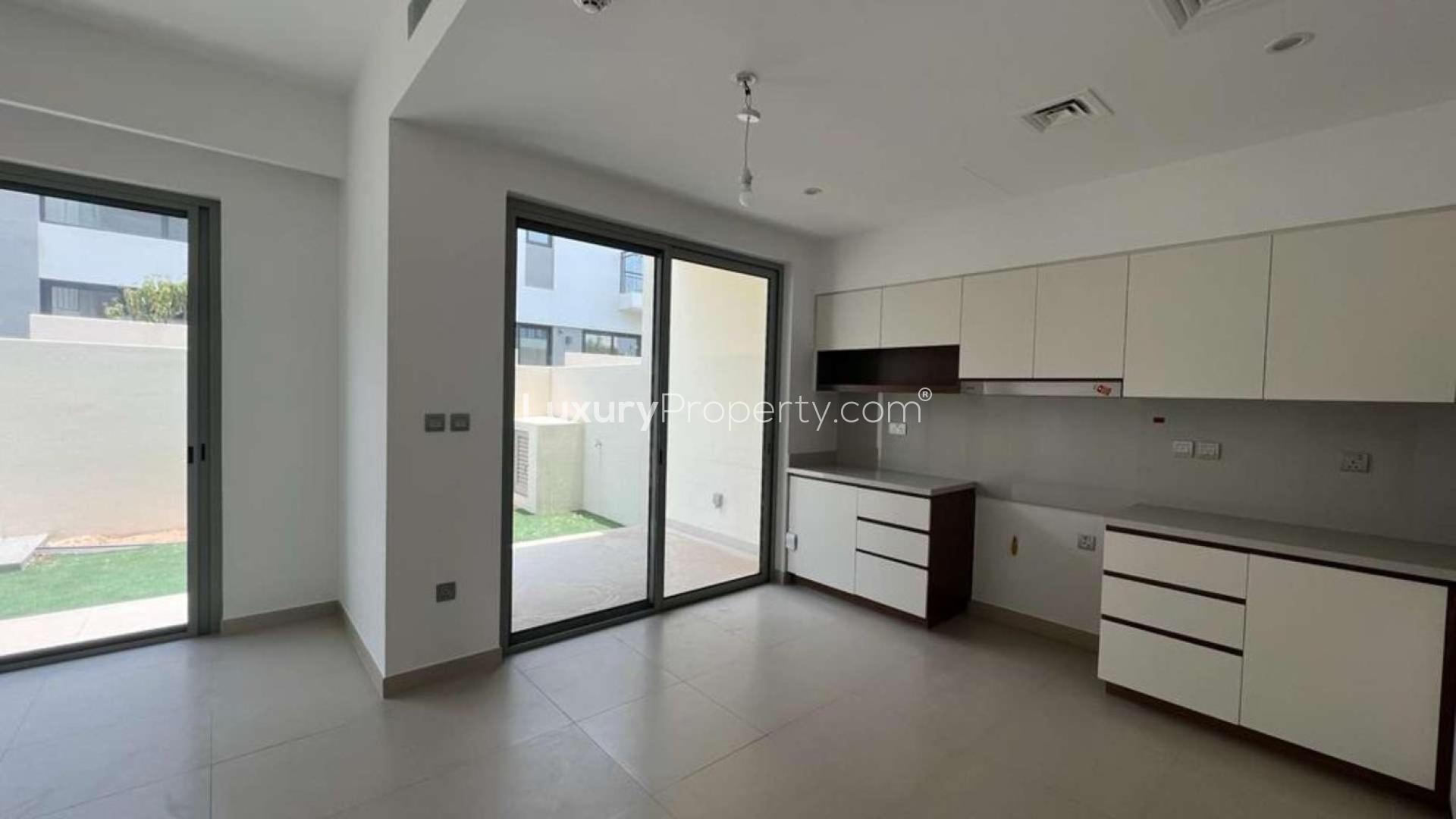 Vacant townhouse kitchen in Camelia, Arabian Ranches 2, available for rent, single row view