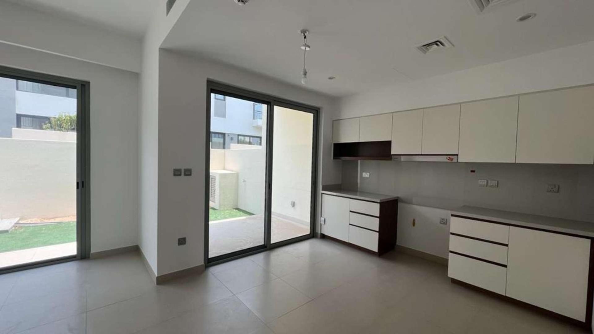 Vacant townhouse kitchen in Camelia, Arabian Ranches 2, available for rent, single row view