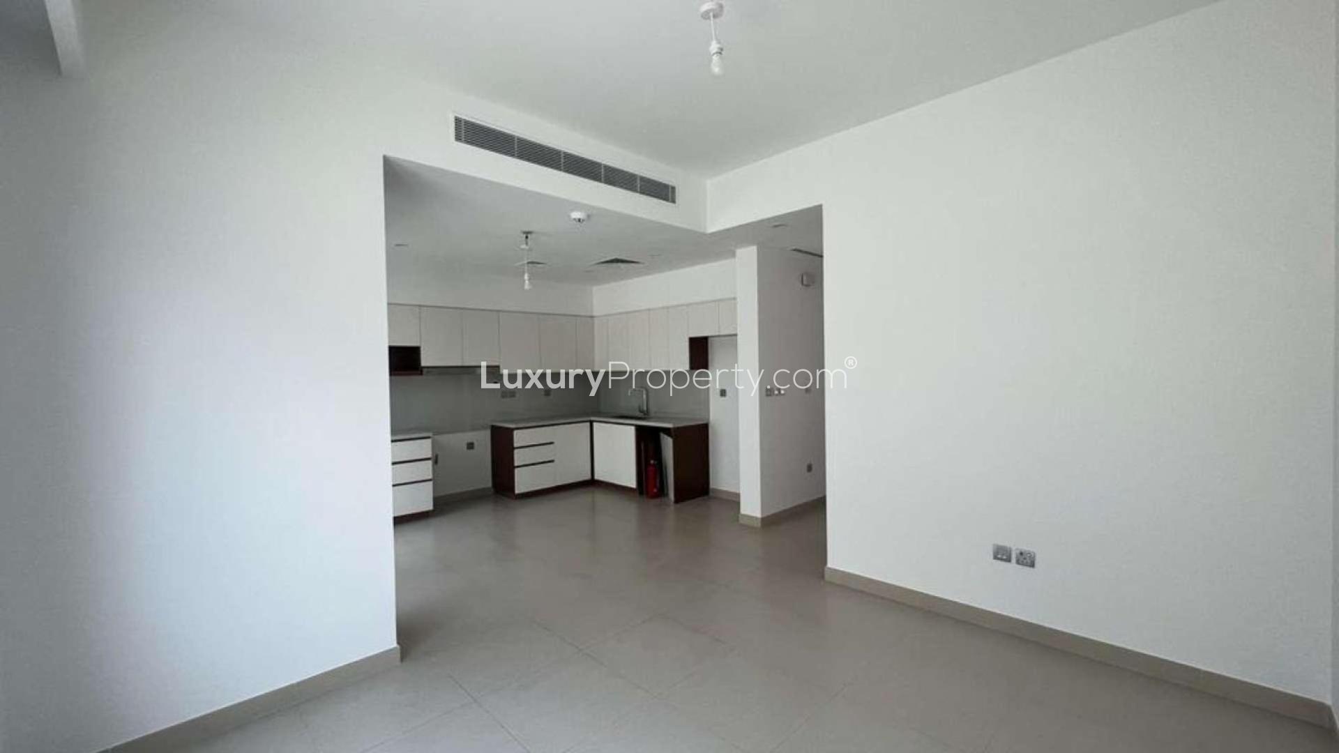 Modern townhouse exterior with balcony in Camelia, Arabian Ranches 2, available for rent