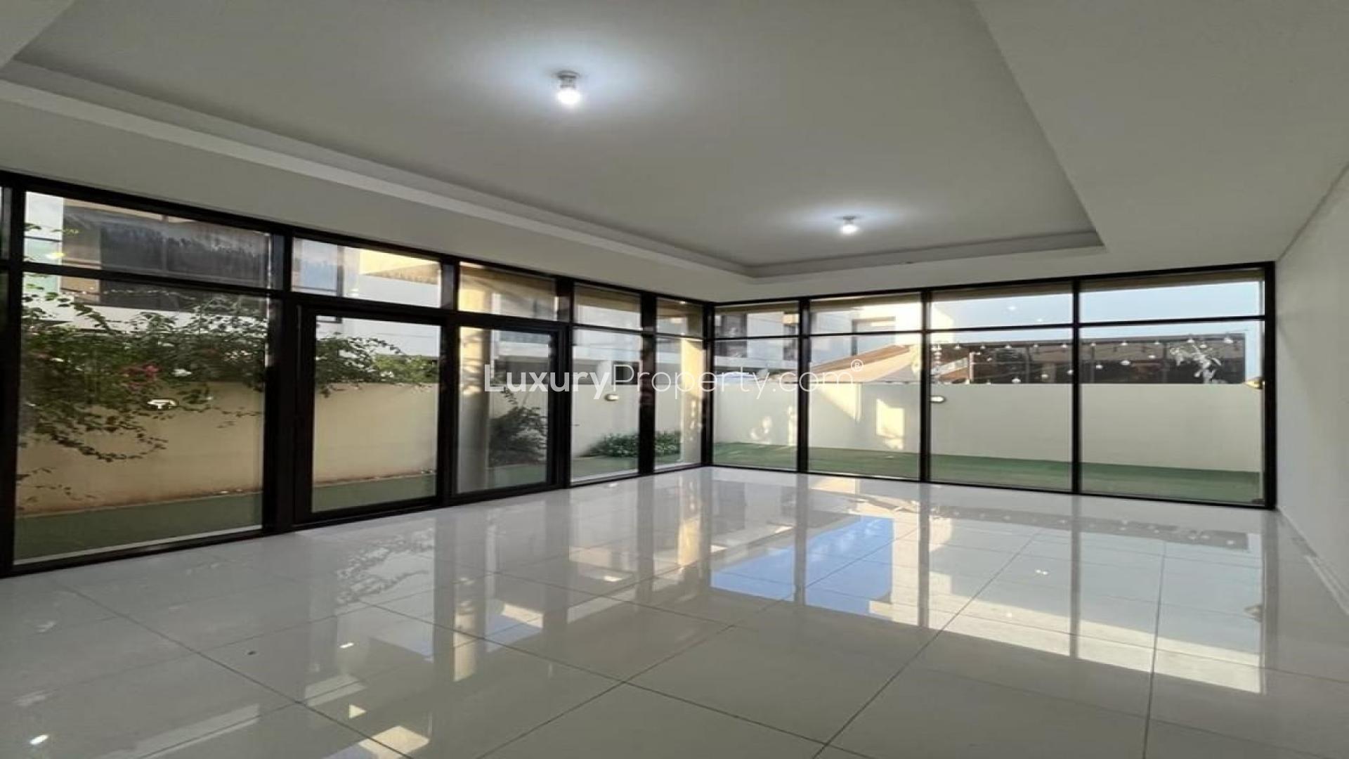 Luxurious 3-bedroom townhouse exterior in Damac Hills, featuring modern design and spacious layout