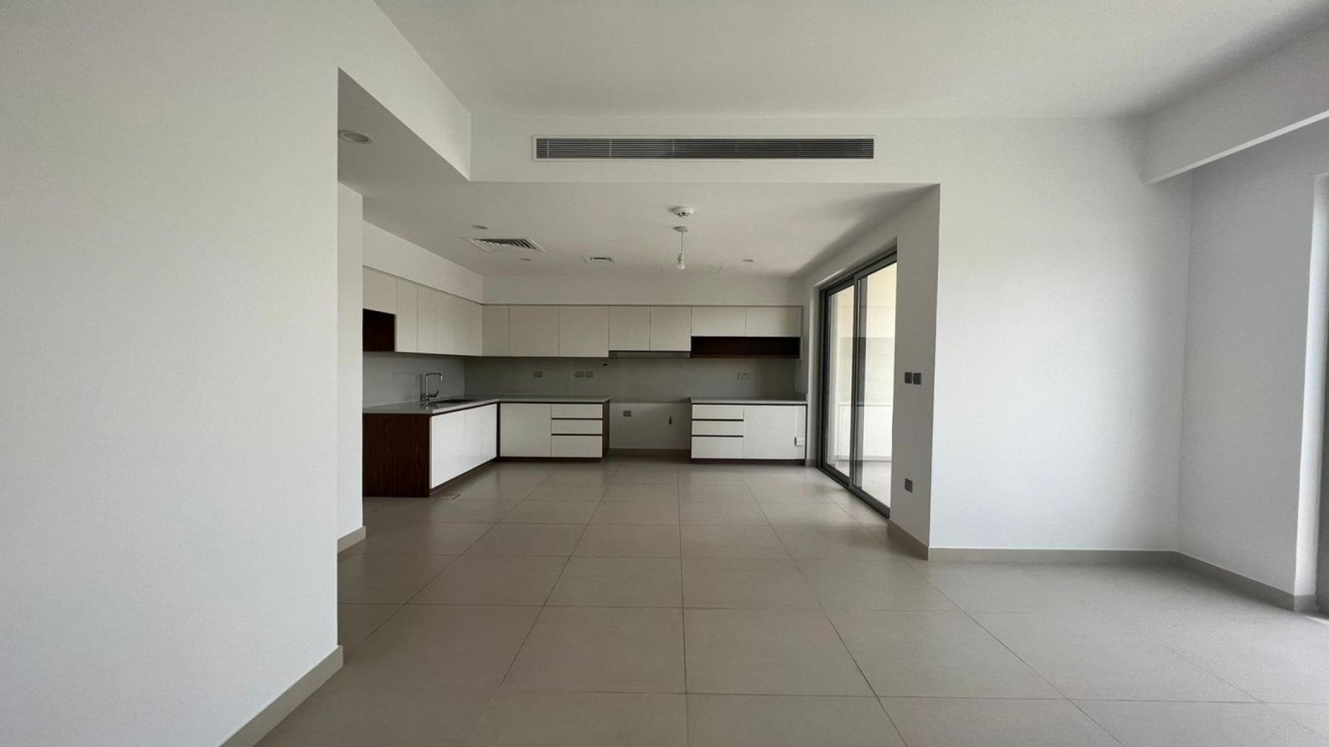 Elegant open-plan kitchen and living area in Camelia townhouse, Arabian Ranches 2 rental