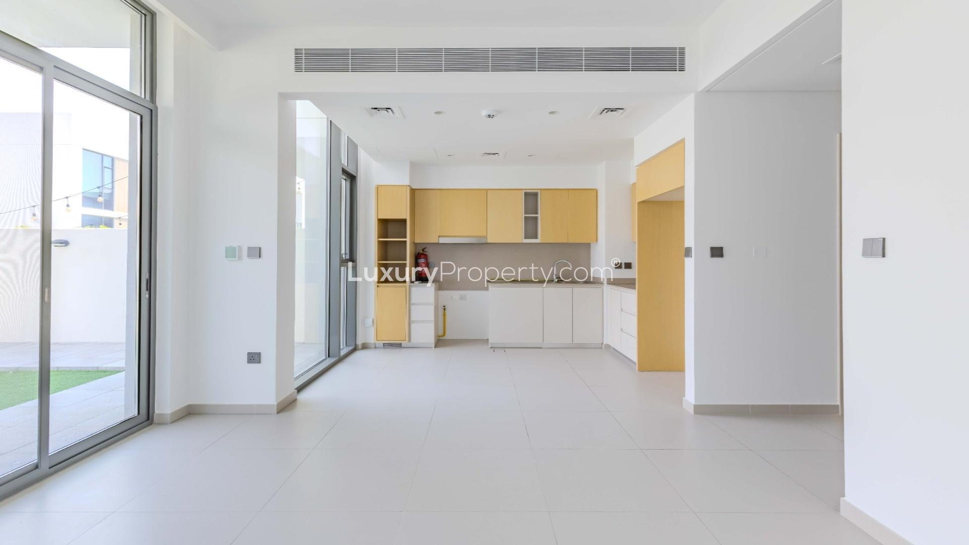 Modern kitchen in spacious 3-bedroom townhouse, Arabian Ranches 3, Spring community, available for rent