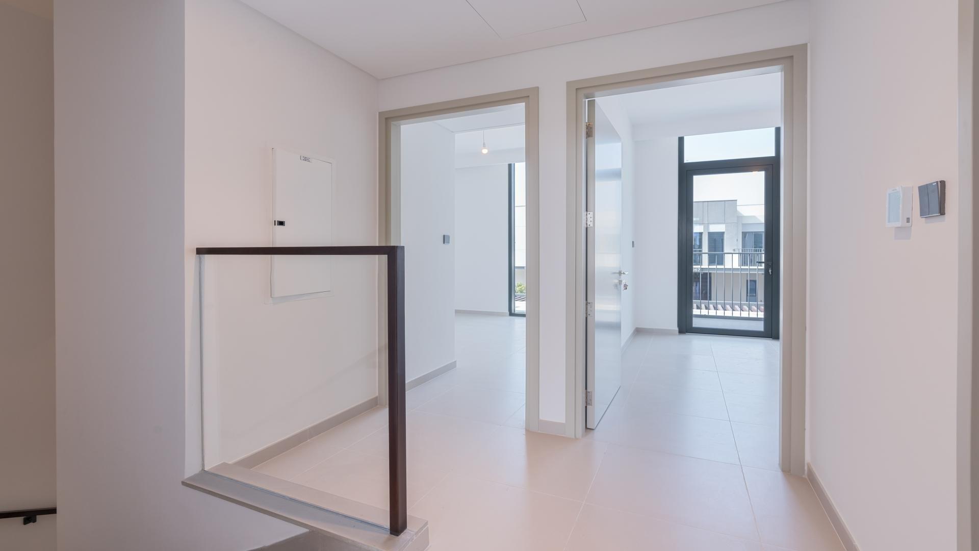 Modern townhouse hallway with stairs, Sun community, Arabian Ranches 3, available for rent