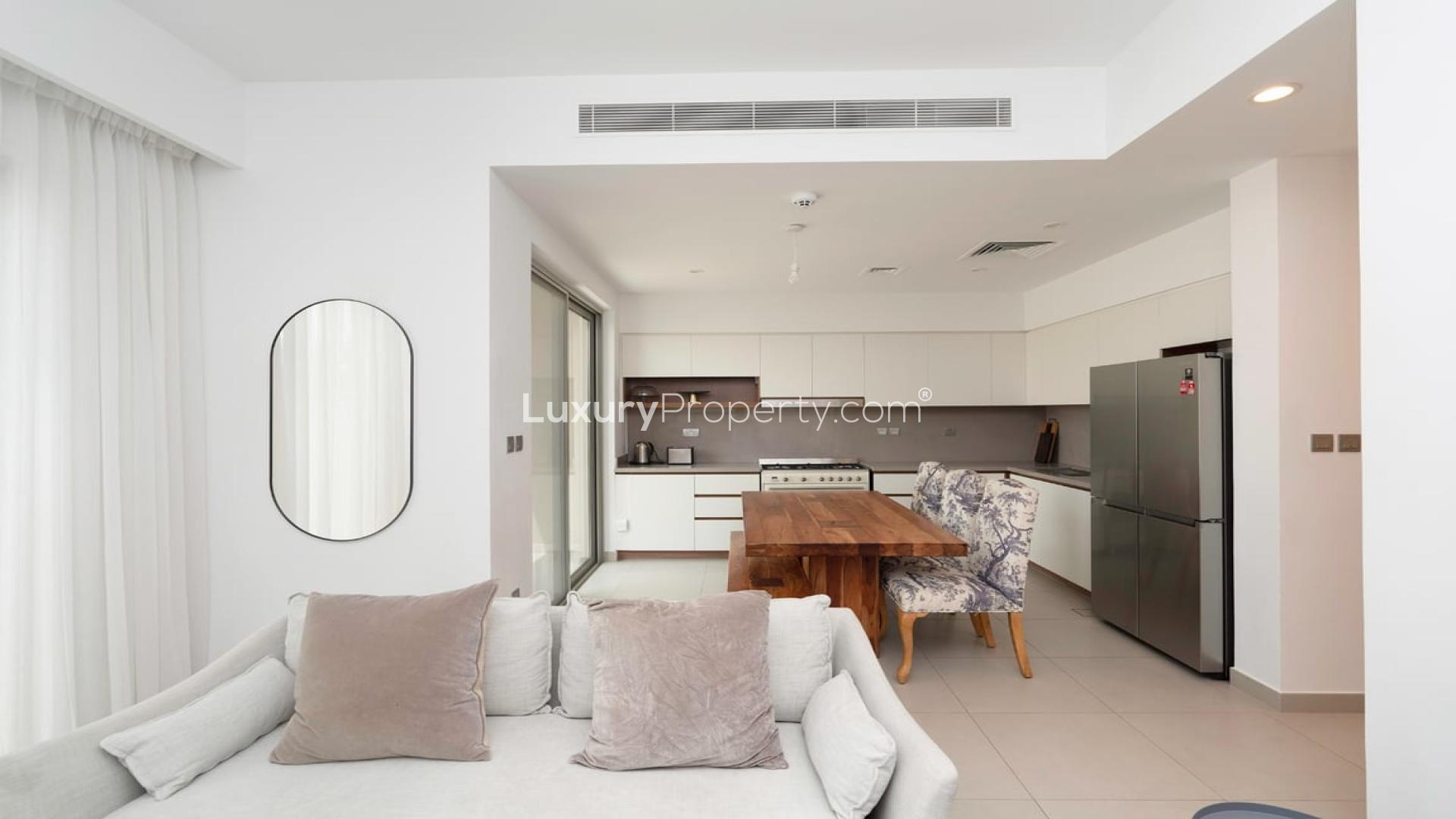 Furnished living room in Camelia townhouse, Arabian Ranches 2, with elegant decor and natural light