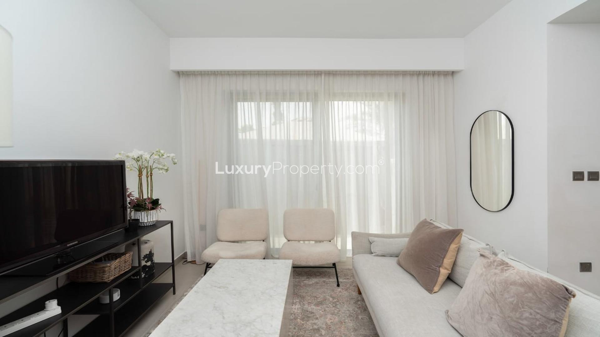 Townhouse exterior in Camelia, Arabian Ranches 2, with carport and front garden, for rent