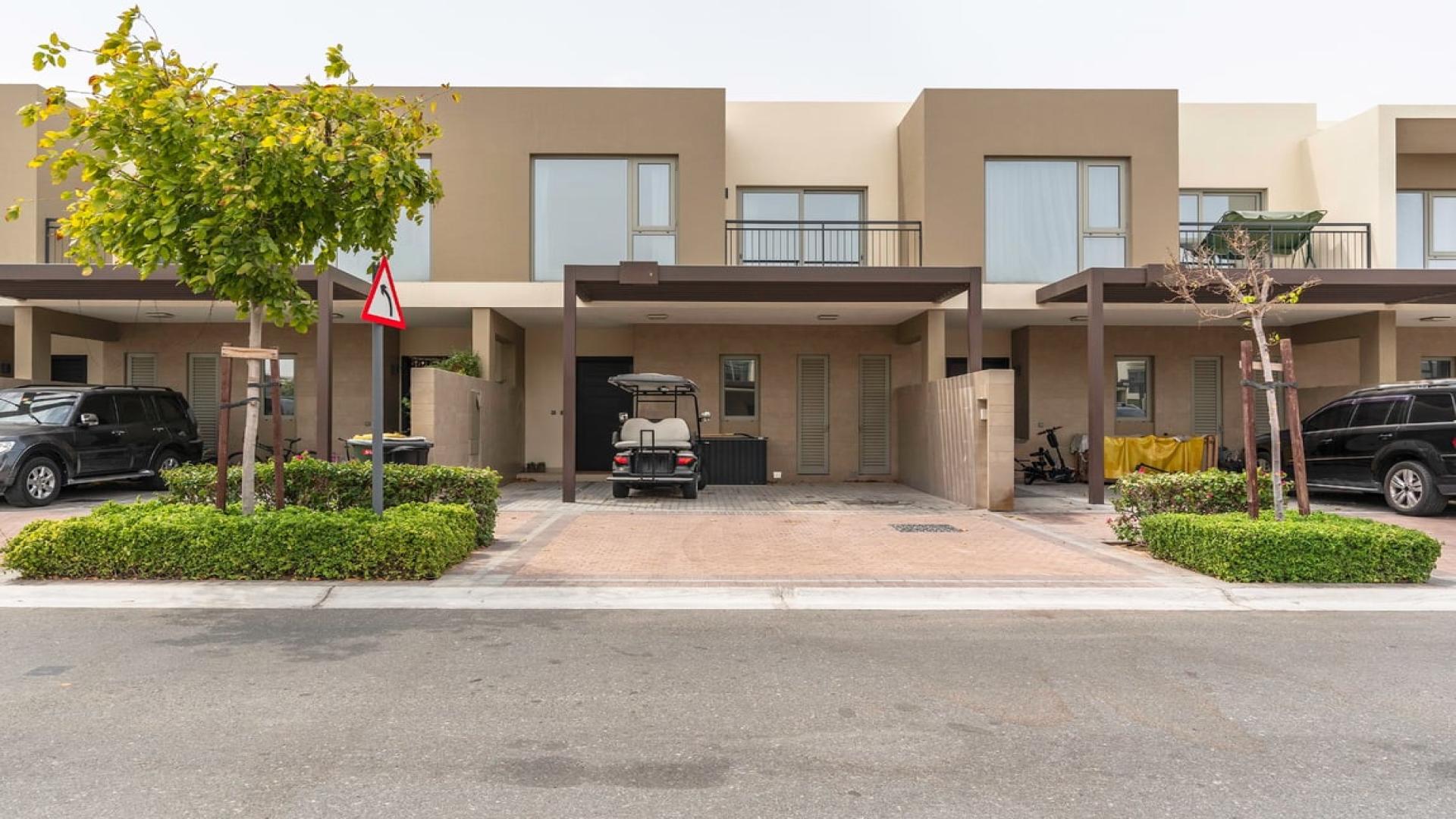 Furnished living room in Camelia townhouse, Arabian Ranches 2, with garden view