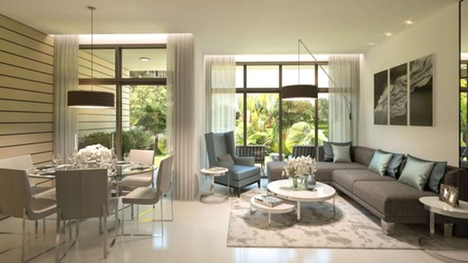Modern dining and living area in 4-bedroom townhouse, Damac Hills 2, Dubai