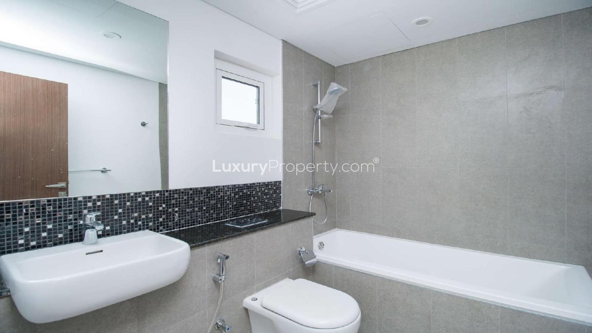 Bright living room in 3-bedroom townhouse, Arabella 2, Mudon, with large windows and tiles