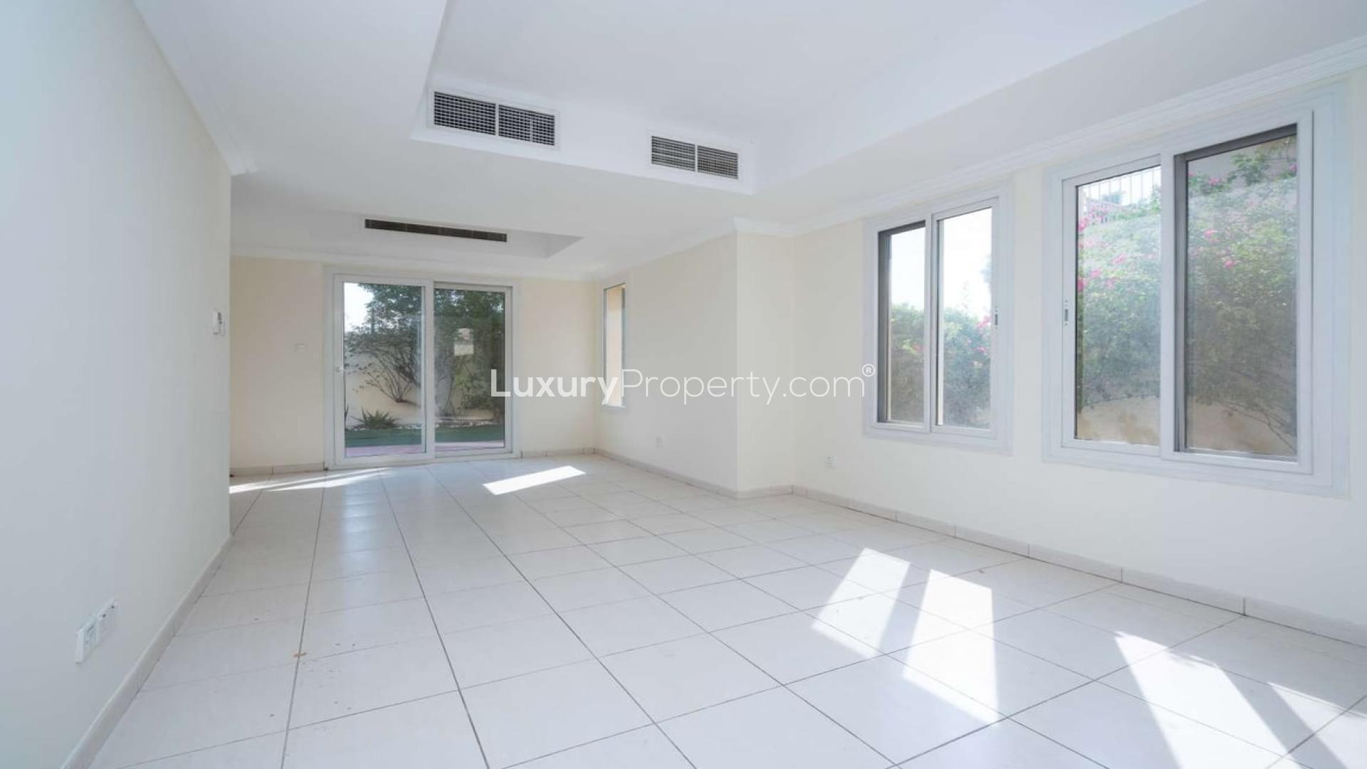 Townhouse exterior in Springs 4 with garden space, ready for rent, three bedrooms