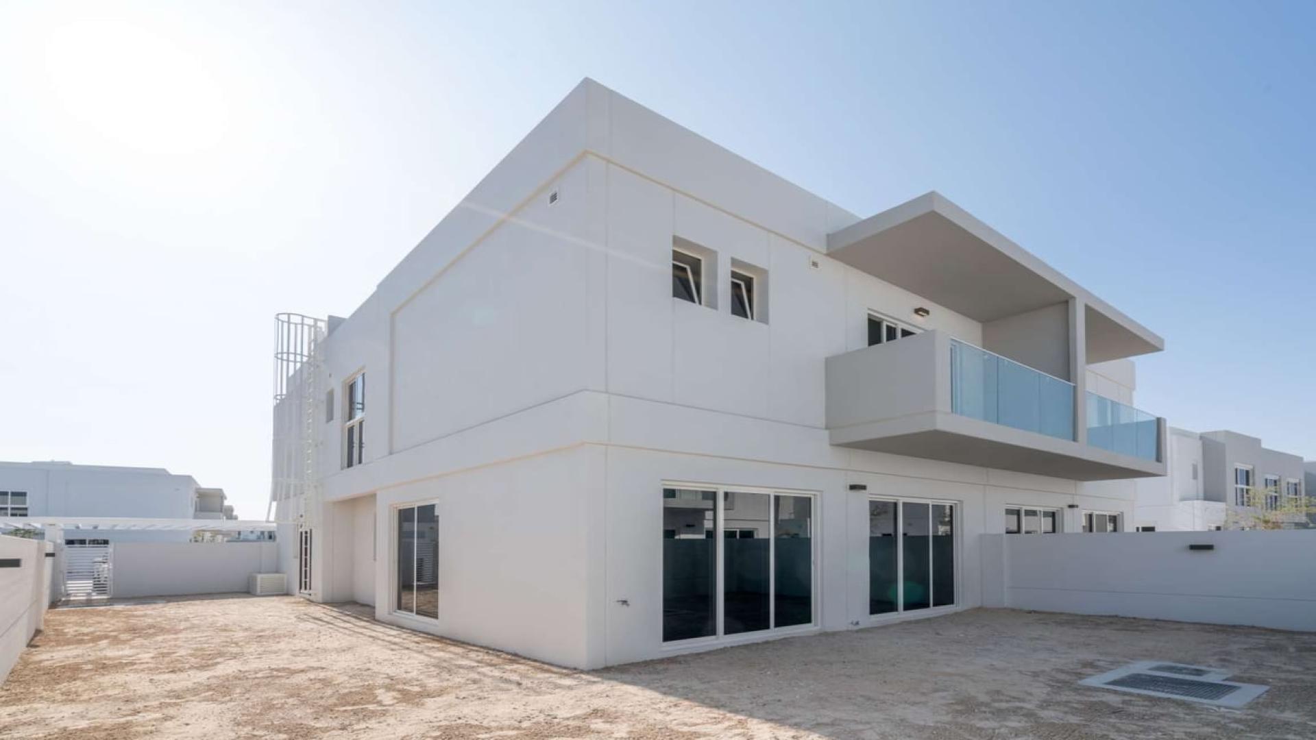 Modern 3-bedroom semi-detached townhouse in Arabella Townhouses, Mudon, with spacious exterior view