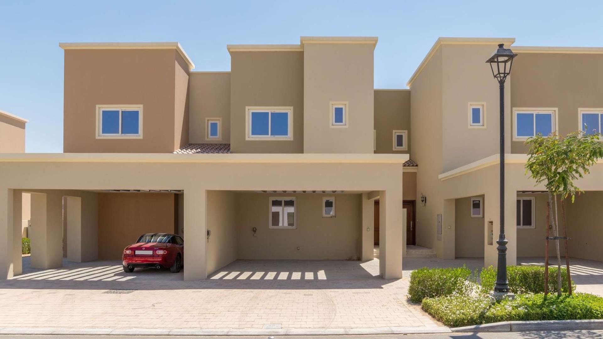 Back-to-back middle unit townhouse for sale in Villanova, Dubai Land with carport