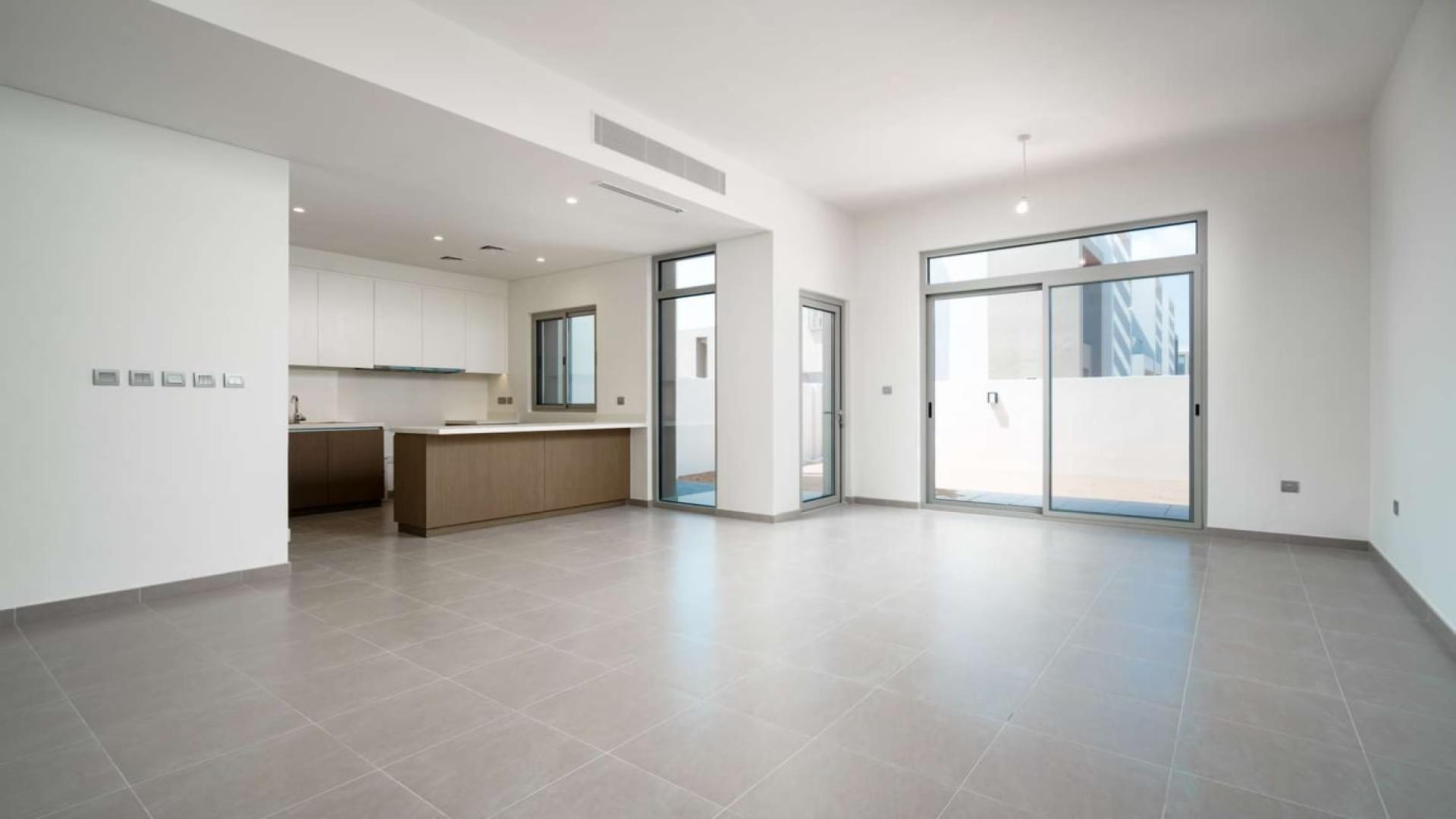 Modern townhouse kitchen and living area in Arabian Ranches 2, Reem Community