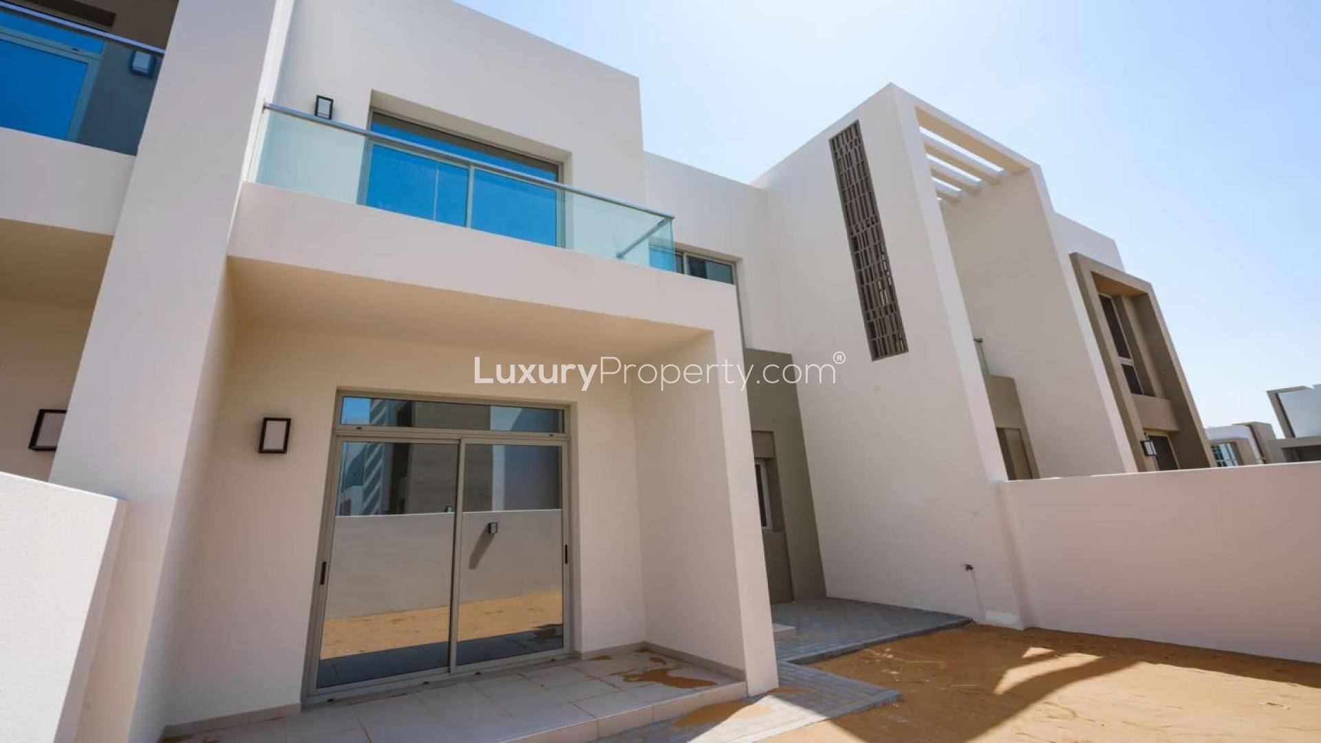 Modern townhouse exterior in Reem Community, Arabian Ranches 2, for sale