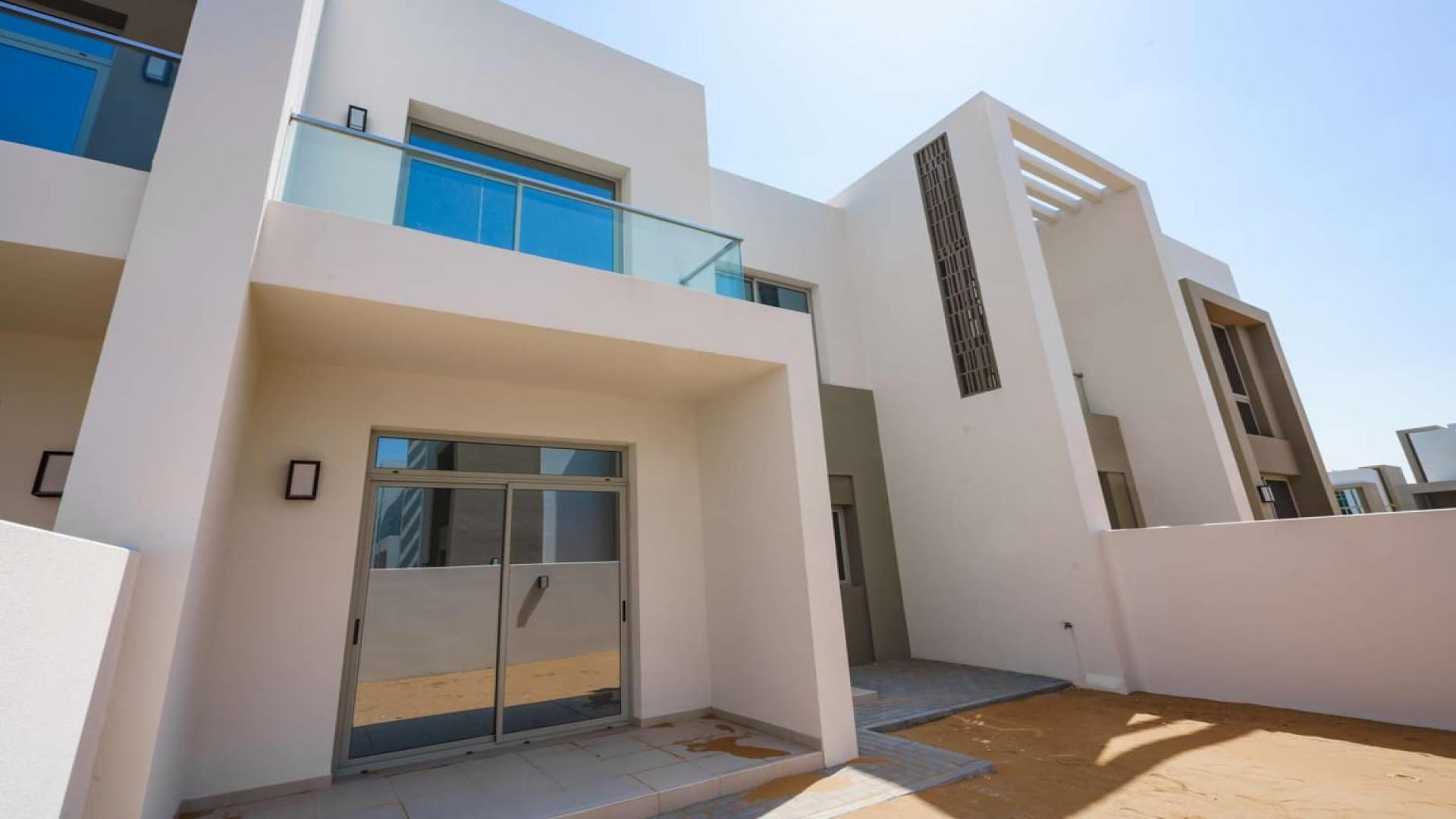 Modern townhouse exterior in Reem Community, Arabian Ranches 2, for sale