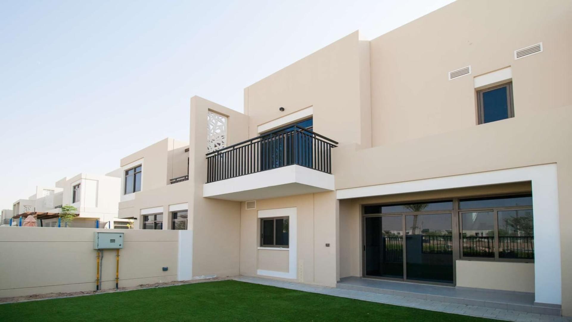 3-bedroom townhouse exterior with private garden in Safi, Town Square, prime location for sale