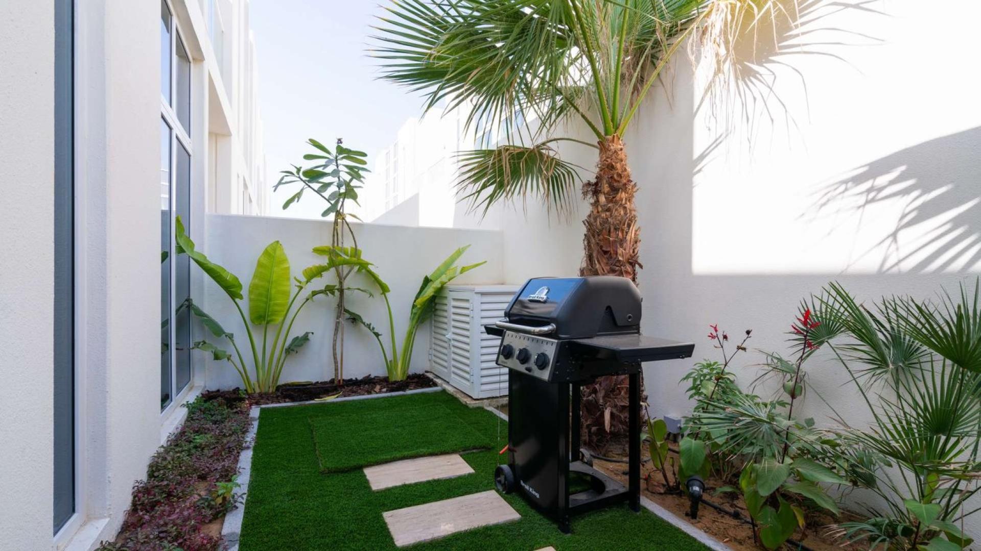 Luxurious living area in 3-bedroom furnished villa, Damac Hills 2, Dubai townhouse for sale