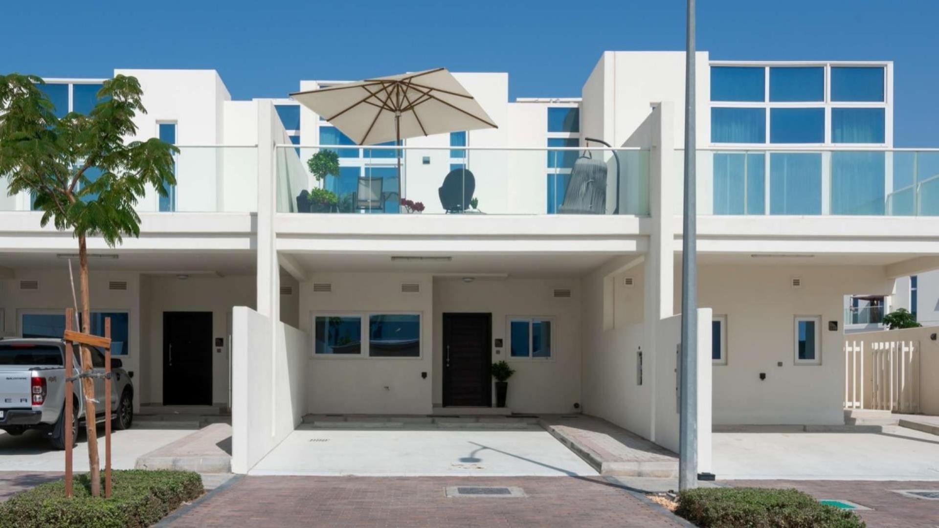 Exterior view of three-bedroom furnished townhouse in Damac Hills 2, Sanctuary community