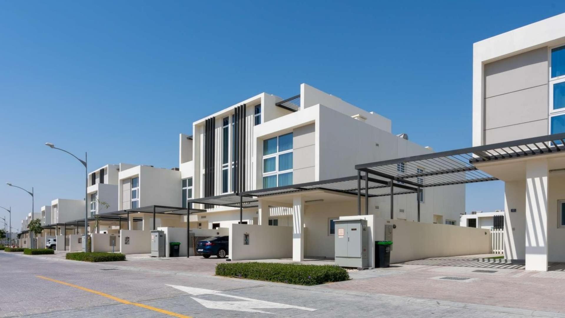 Modern townhouse exterior in Trixis, Damac Hills 2, available for sale