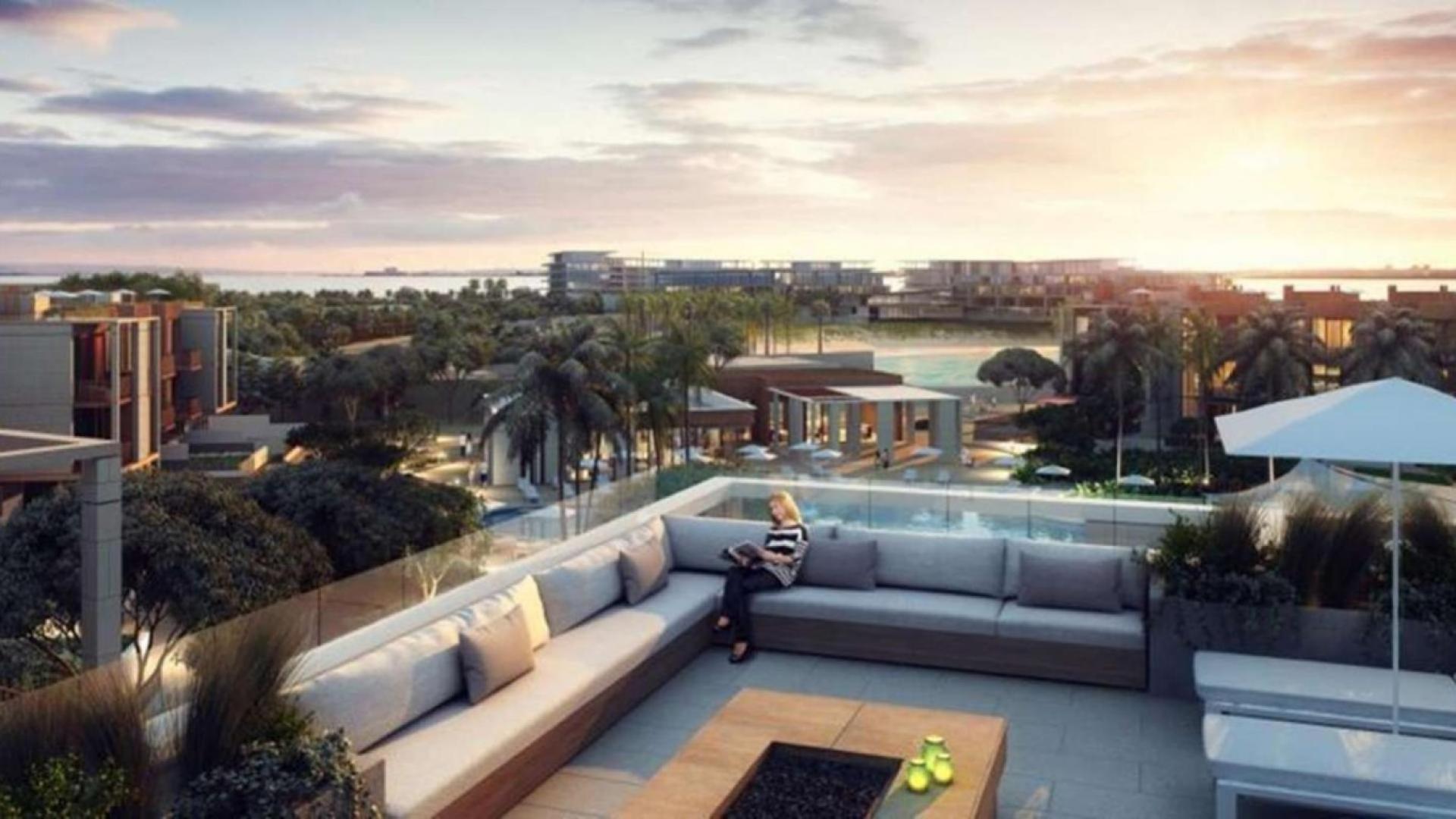 Contemporary townhouse view with lush gardens, Jumeirah Bay Island, for sale