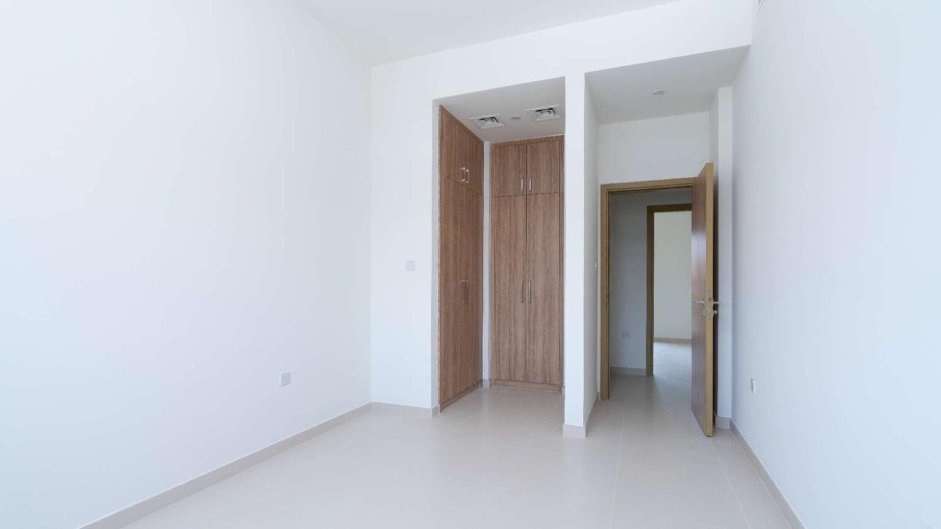 Single row townhouse exterior in Villanova, Dubai Land, for sale. Ref No: LP08187
