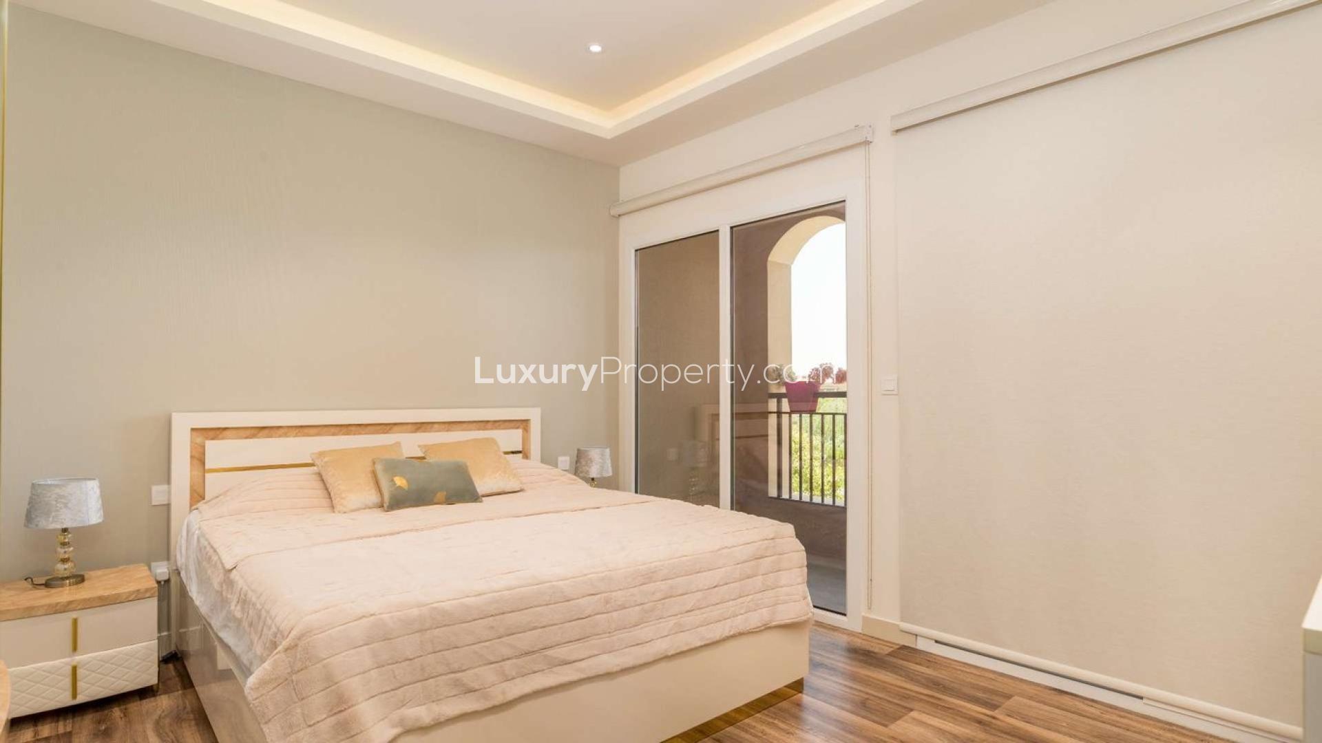 Outdoor patio with dining area in Serena Casa Dora townhouse for sale