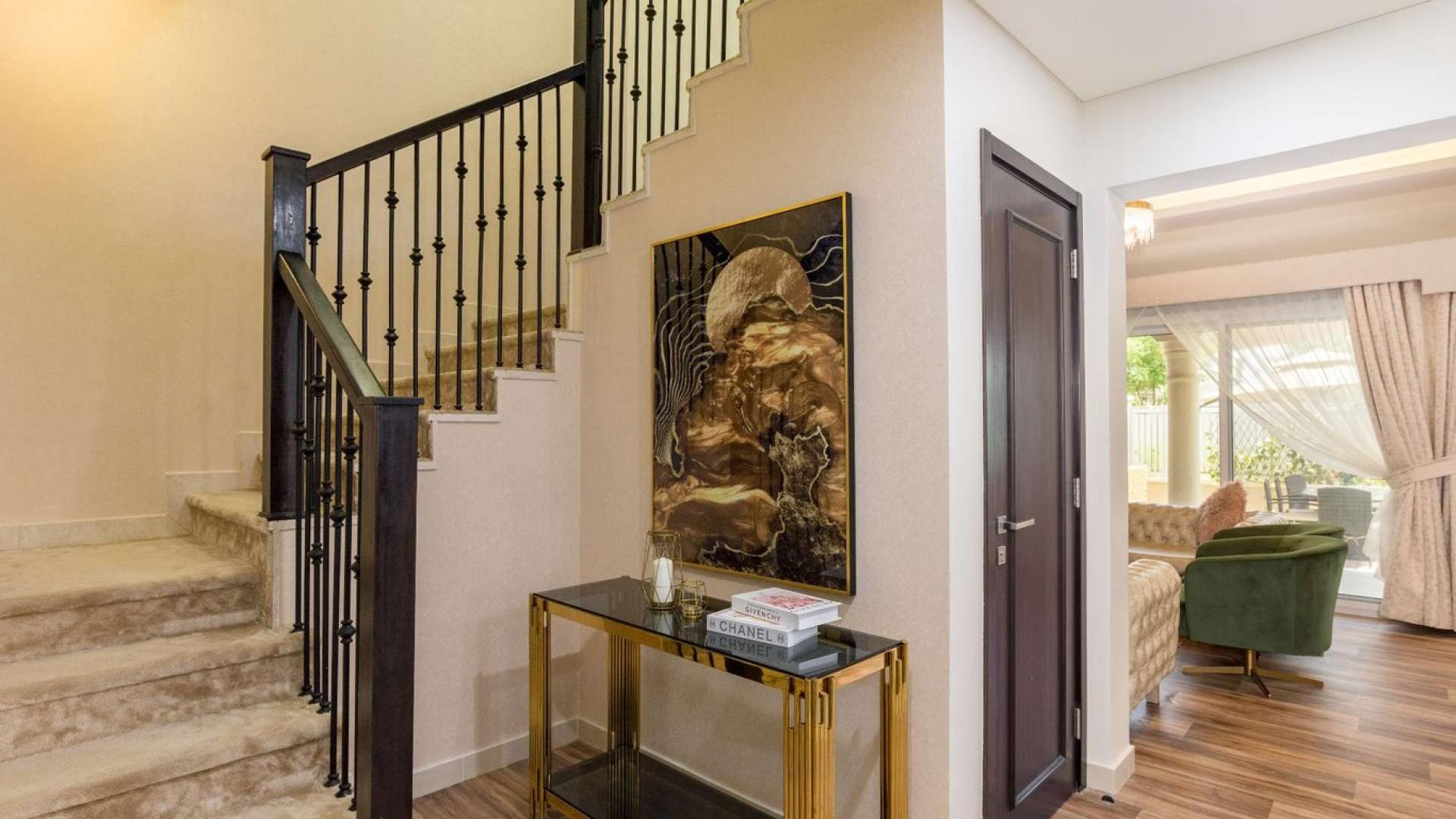 Elegant living area in three-bedroom townhouse, Serena Casa Dora, with modern furnishings and natural light