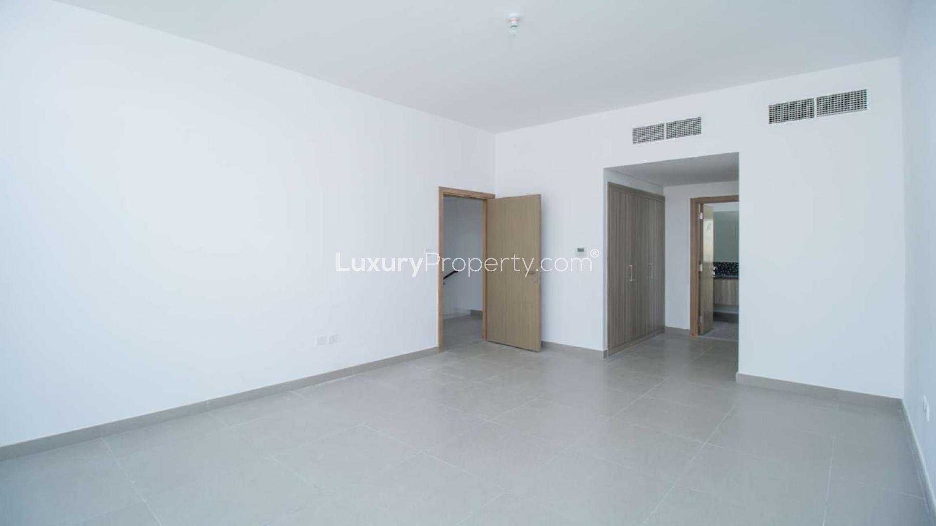 Charming three-bedroom corner townhouse exterior in Arabella 2, Mudon community for sale