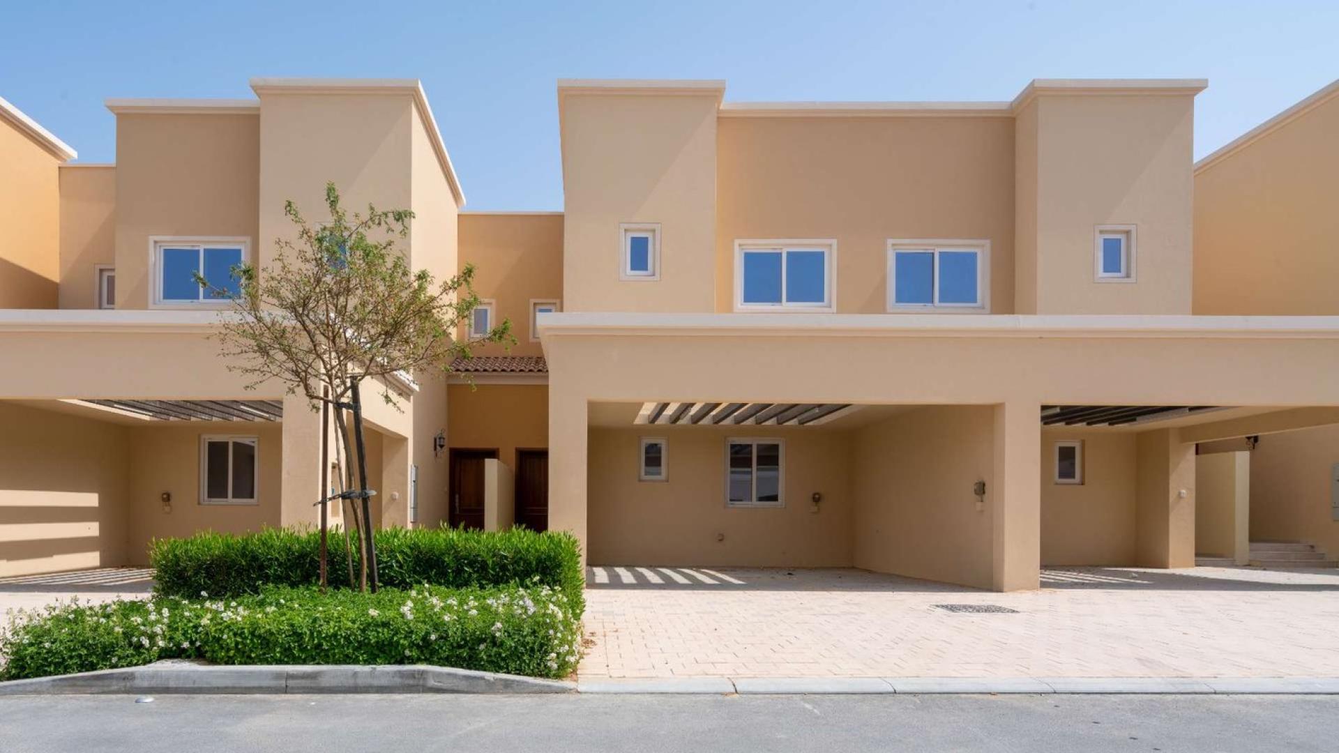 Modern 3-bedroom townhouse for sale in Villanova, Dubai Land, near community entrance