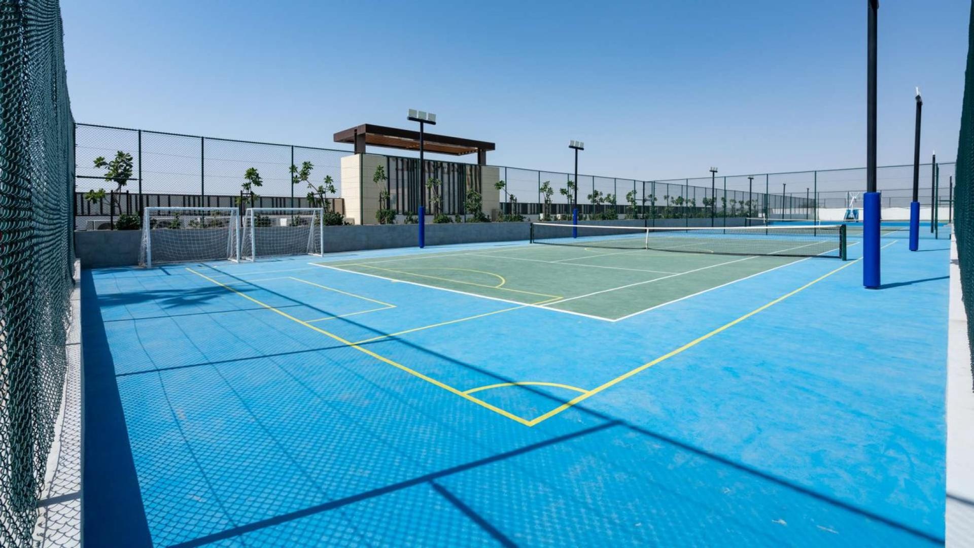 Modern kitchen in luxury 3-bedroom townhouse, Damac Hills 2, Avencia. Bright countertops and cabinets