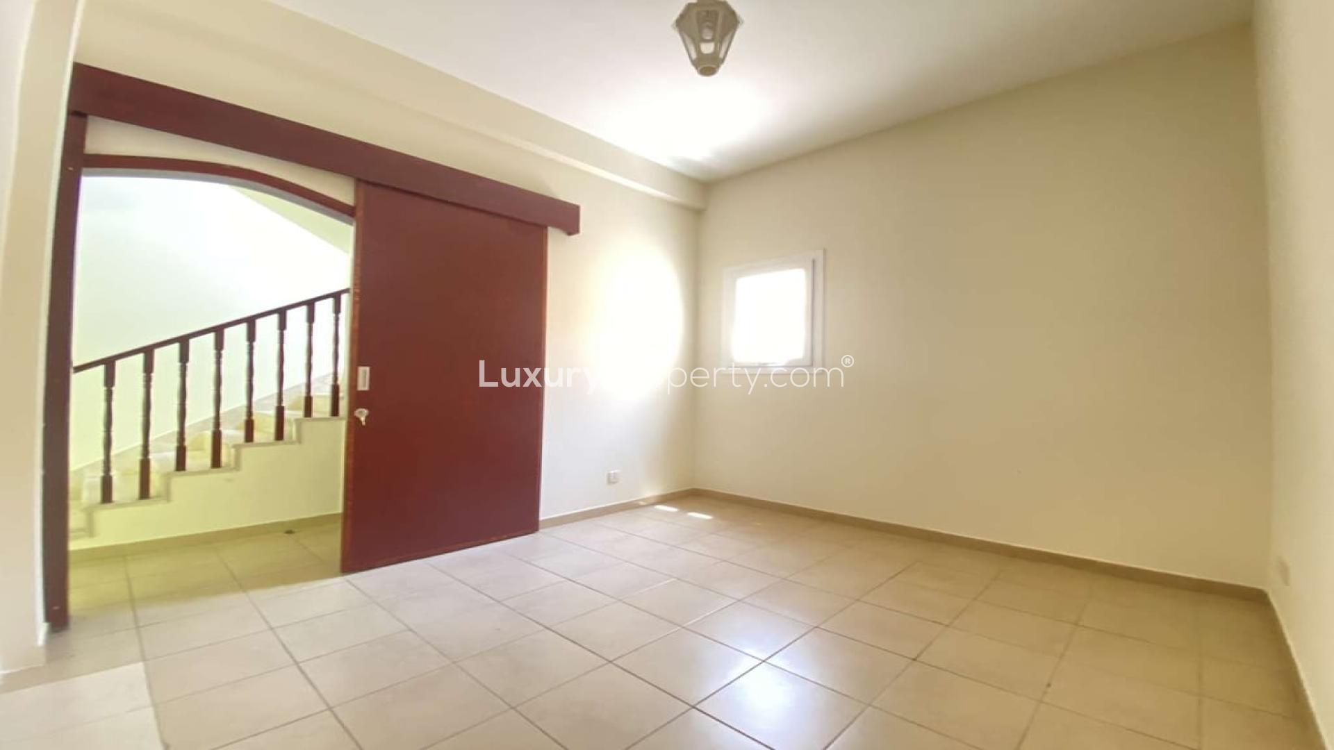 Modern kitchen in Type 3M townhouse, Al Reem, Arabian Ranches, with white cabinets and countertops