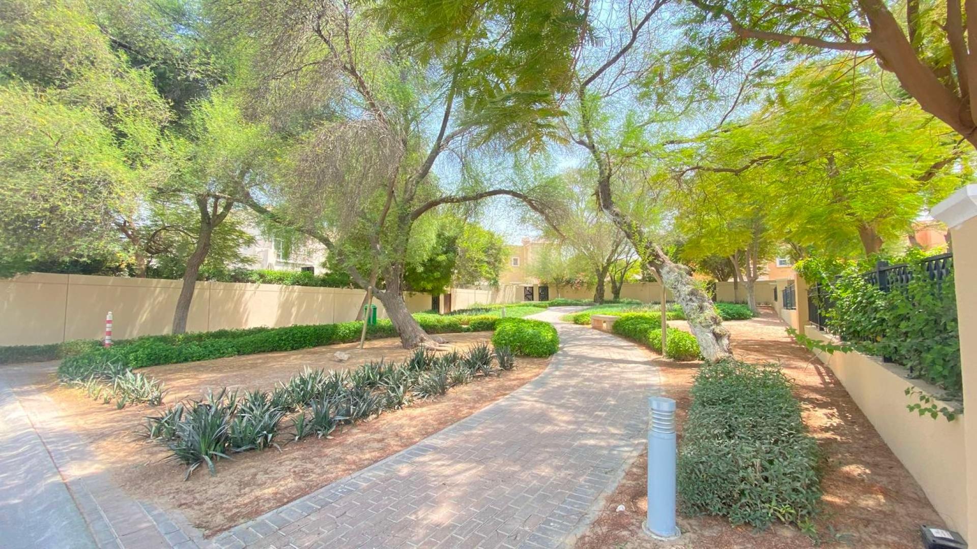 Townhouse exterior with garden in Al Reem, Arabian Ranches, 3-bedroom property for sale