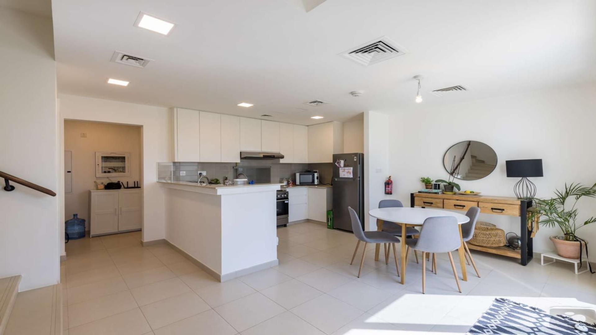 Exterior view of modern 3-bedroom townhouse in Noor, Town Square for sale