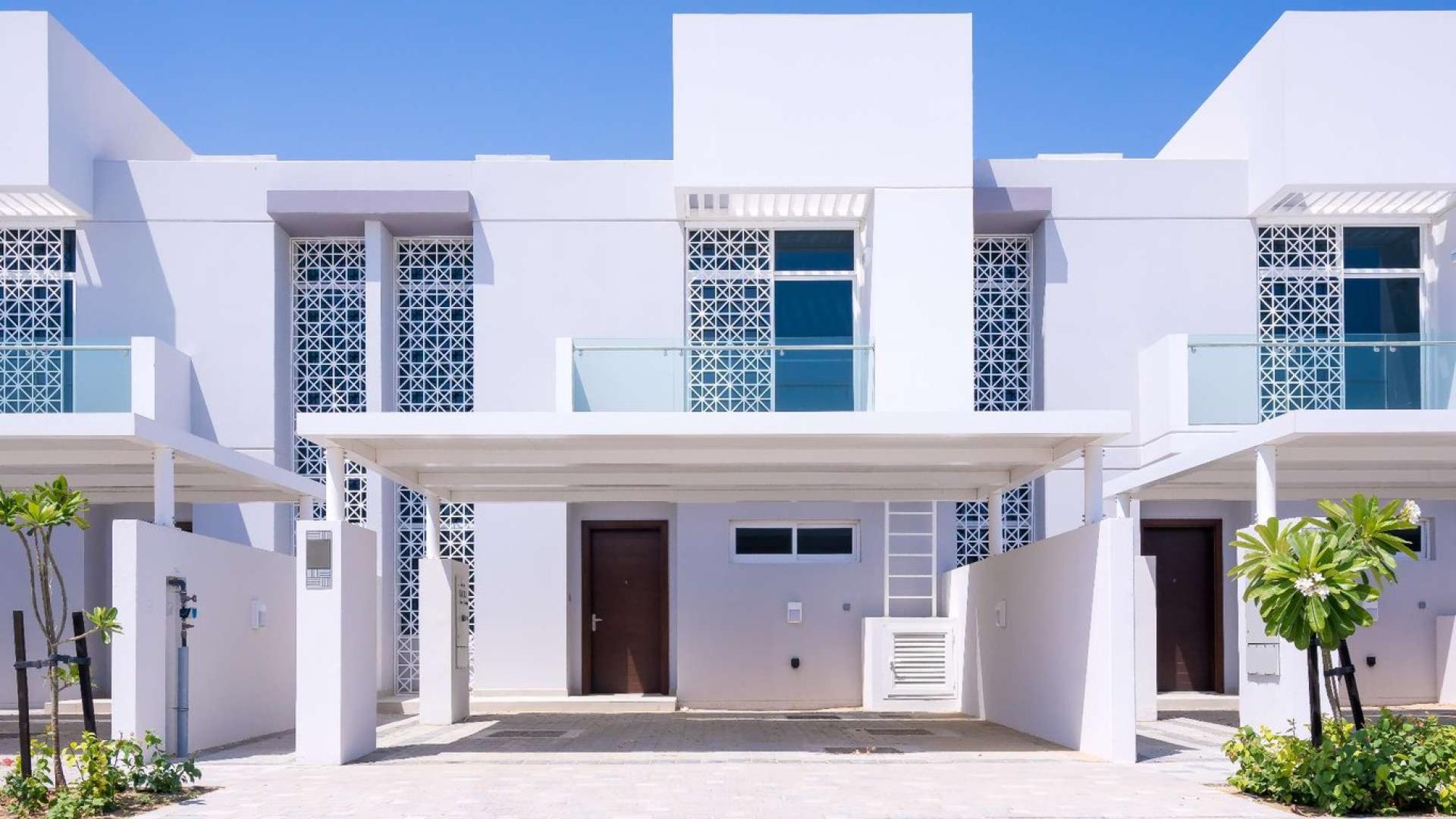 Spacious living area with large windows in Arabella townhouse, Mudon for sale