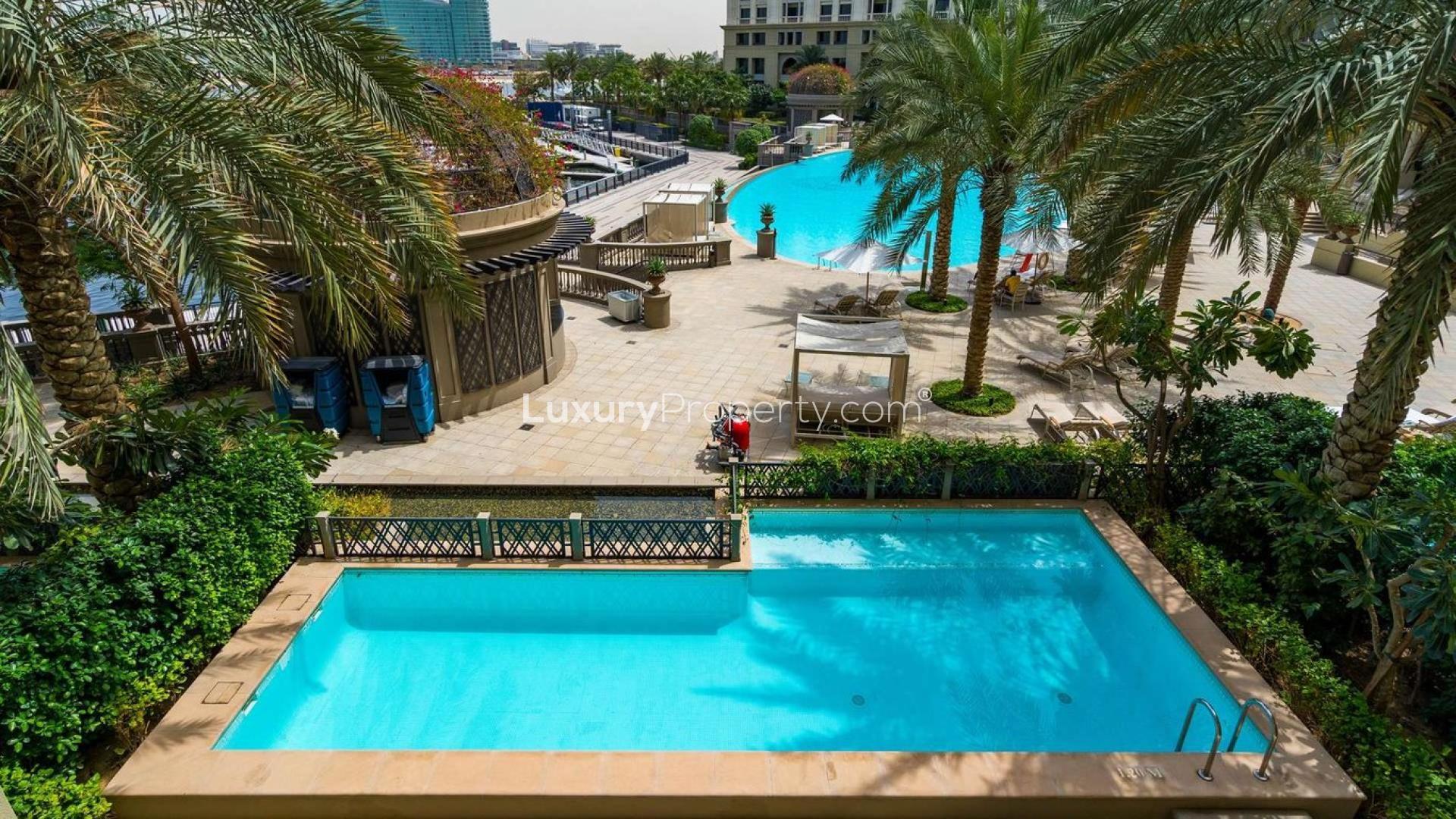 Luxurious living room in Versace villa, Culture Village, with elegant decor and pool view