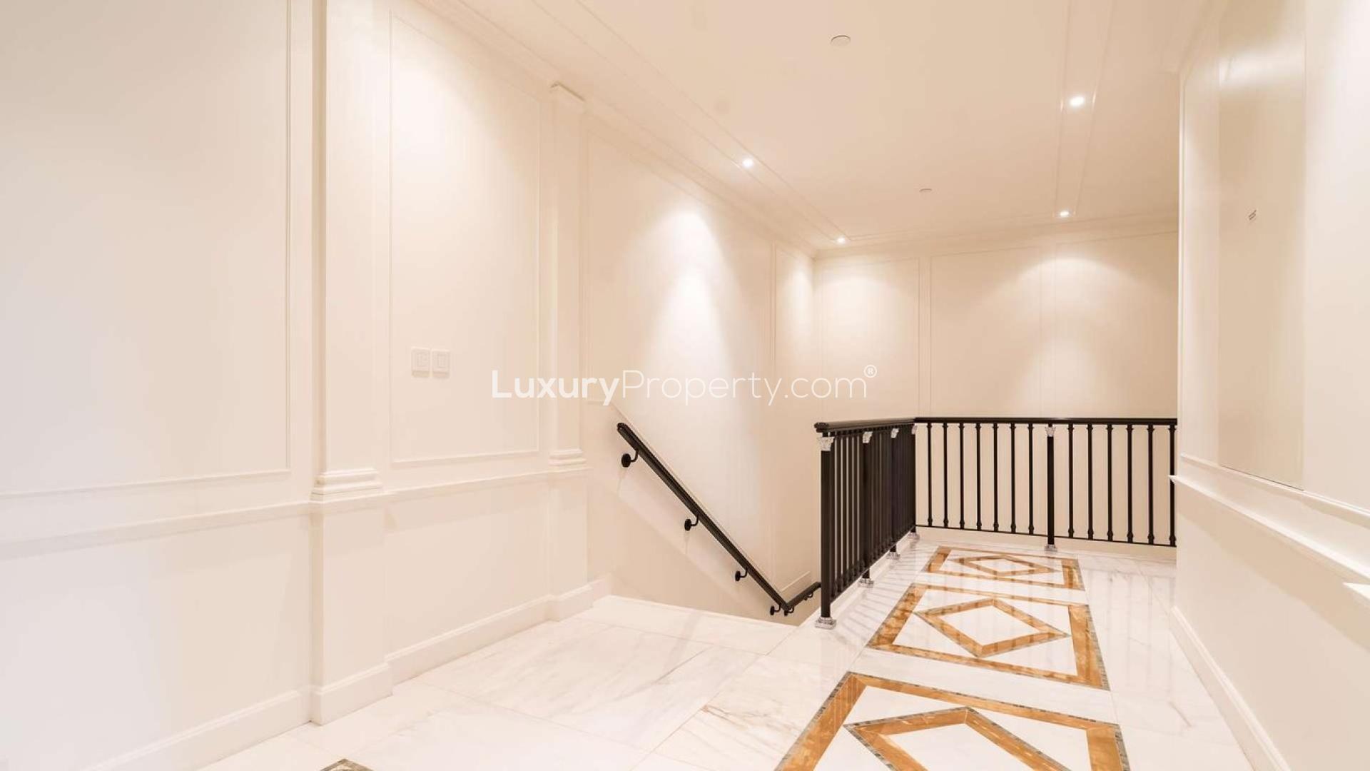 Luxurious living room in Palazzo Versace townhouse, Culture Village, with pool view