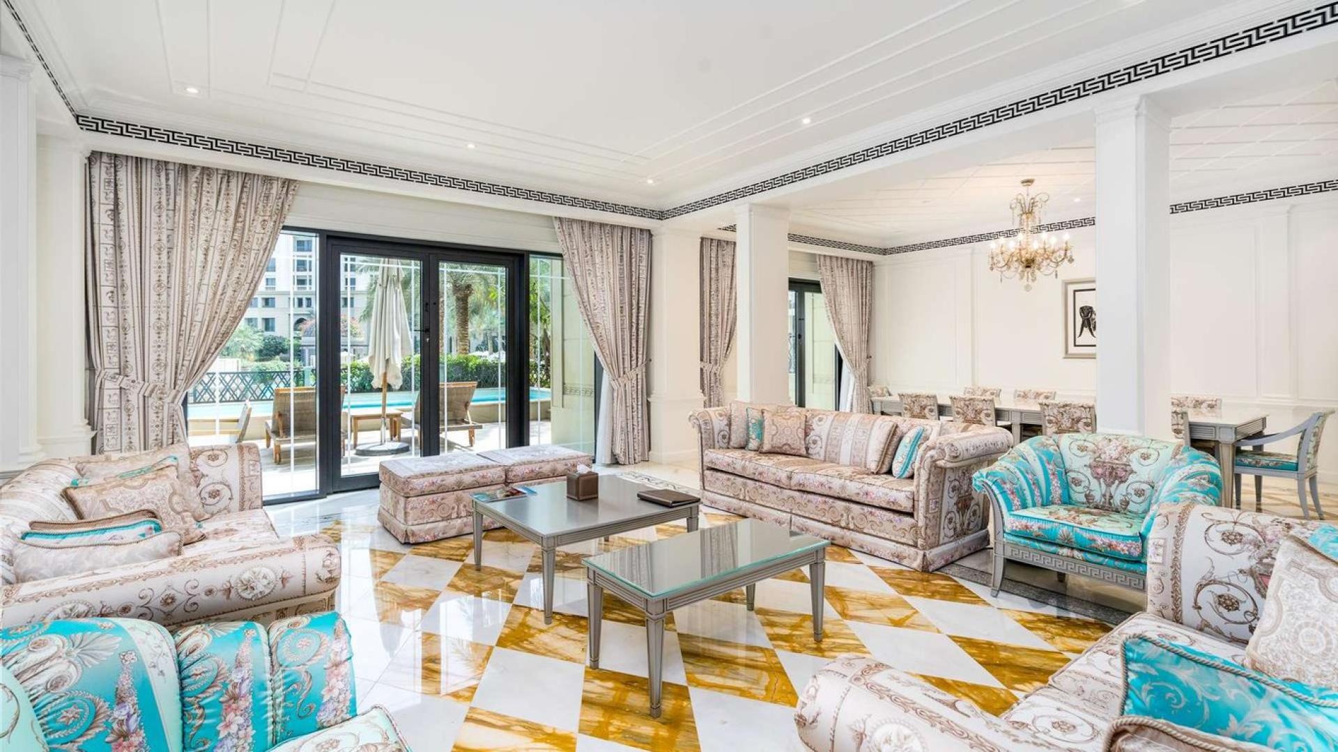 Luxurious living room in Palazzo Versace townhouse, Culture Village, featuring elegant decor and furnishings