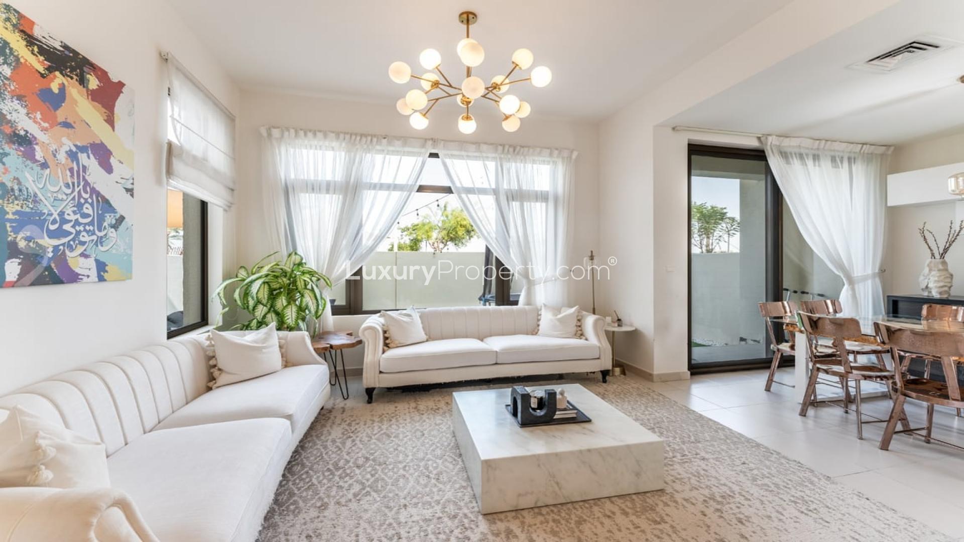 Elegant living room in 3-bedroom townhouse, Mira Oasis 1, Reem, with modern decor and natural light