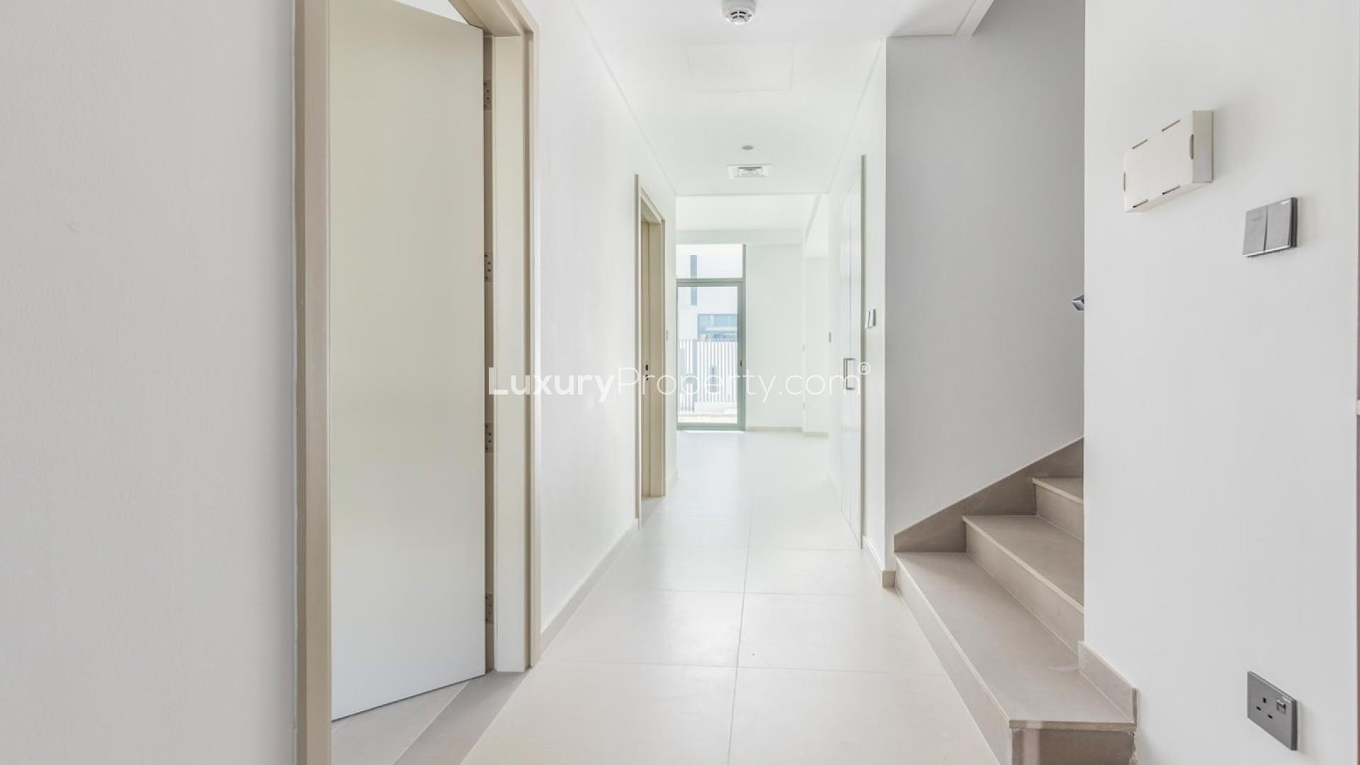 Modern kitchen and living area in Joy townhouse, Arabian Ranches 3, for sale