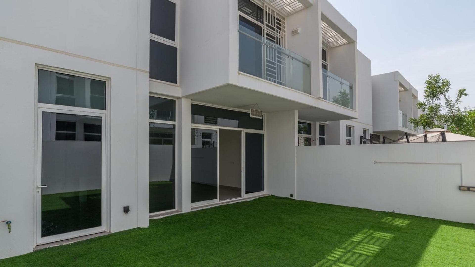 Bright living area with large windows in Mudon Arabella townhouse for sale