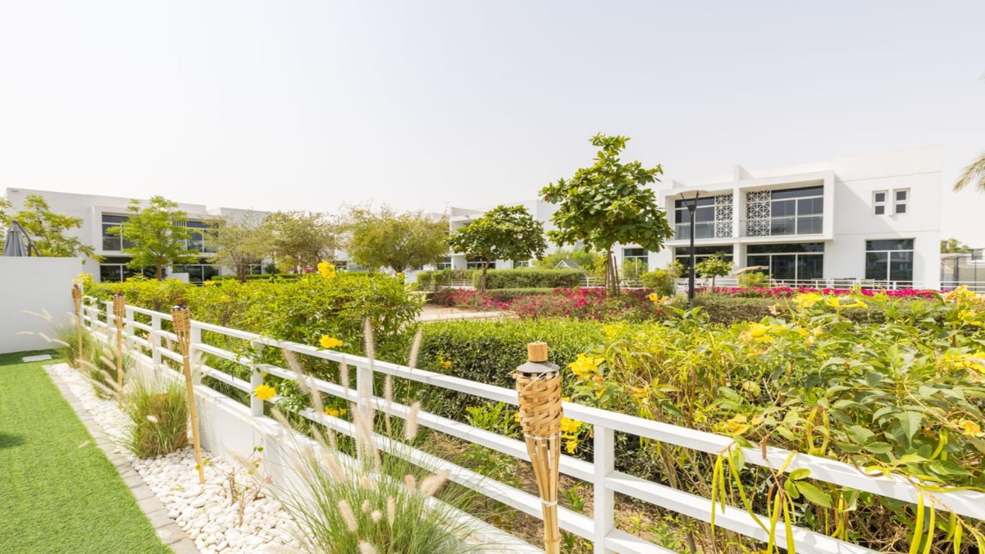 Contemporary living room in Arabella Townhouse, Mudon with modern furniture and large windows