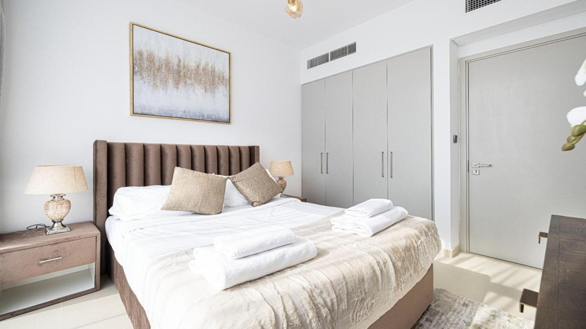 Modern dining and living area in Arabian Ranches 3 Joy townhouse for sale