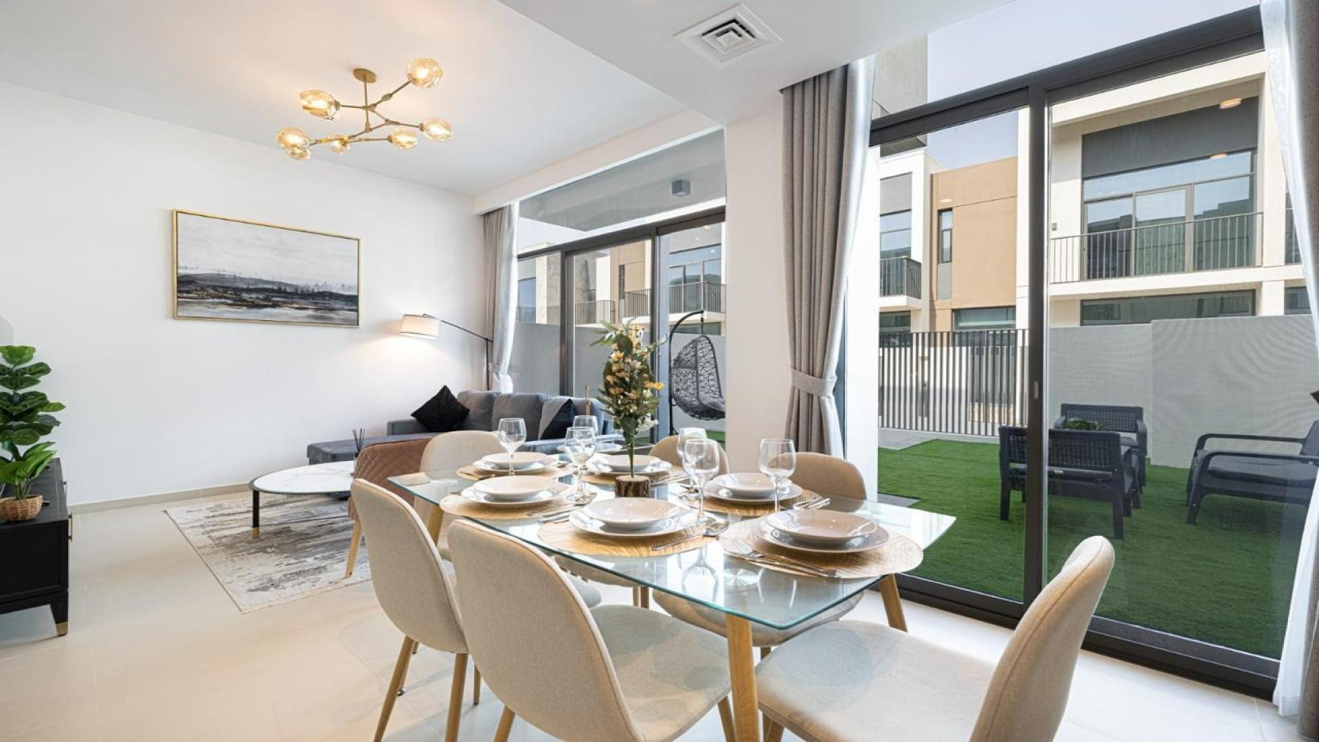 Modern living room and kitchen in Arabian Ranches 3 townhouse for sale, Joy community