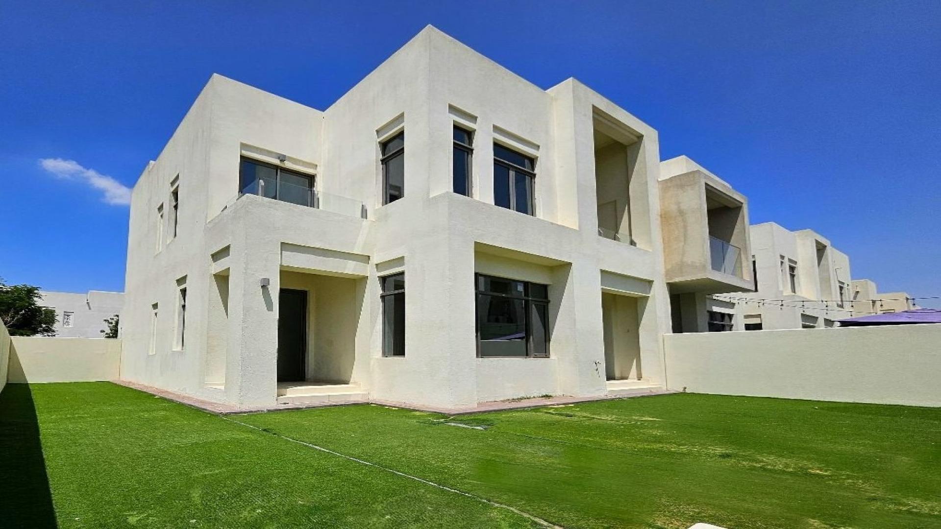 Exterior view of townhouse with private garden in Mira Oasis, Reem community for sale